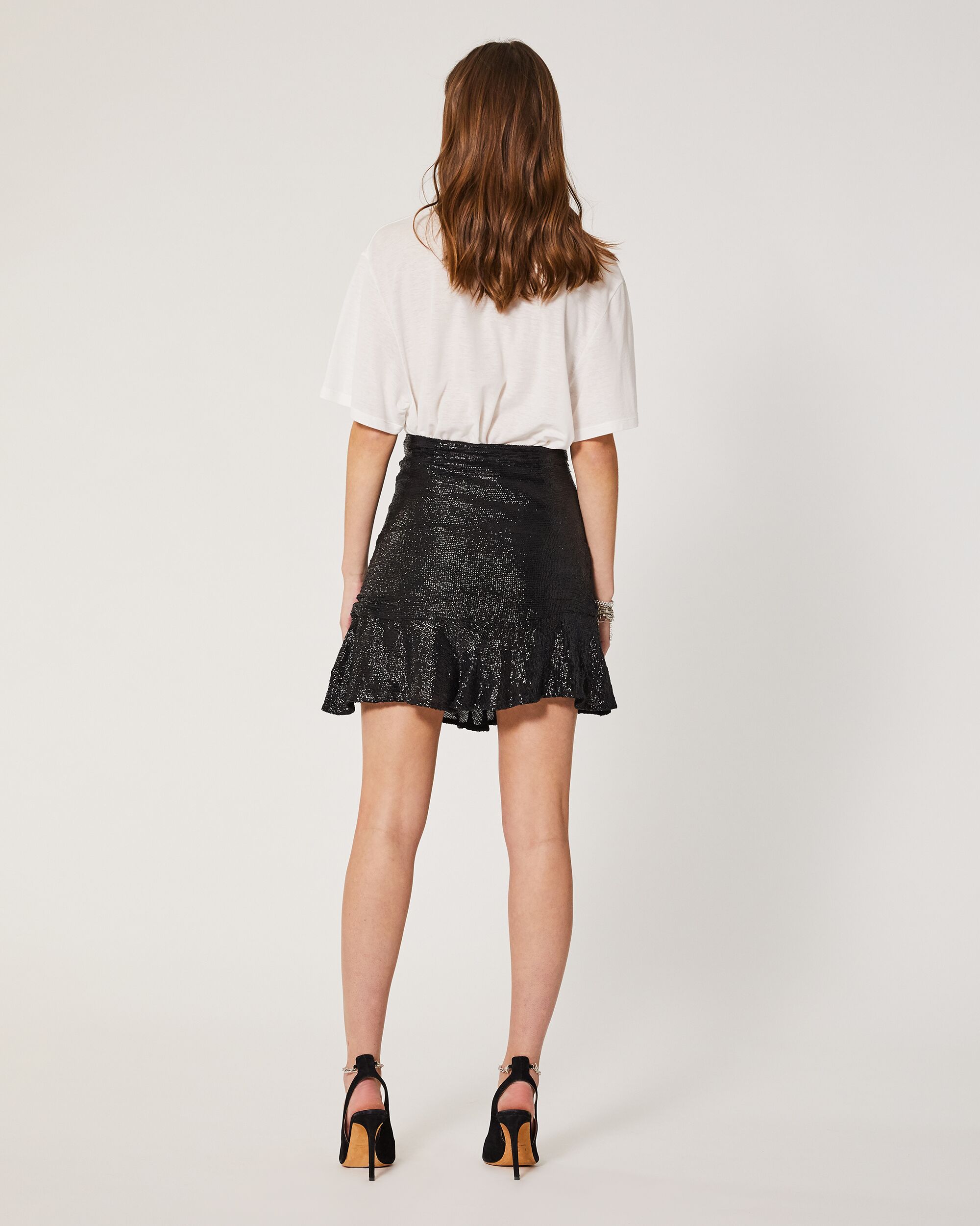 embroidered skirt black top