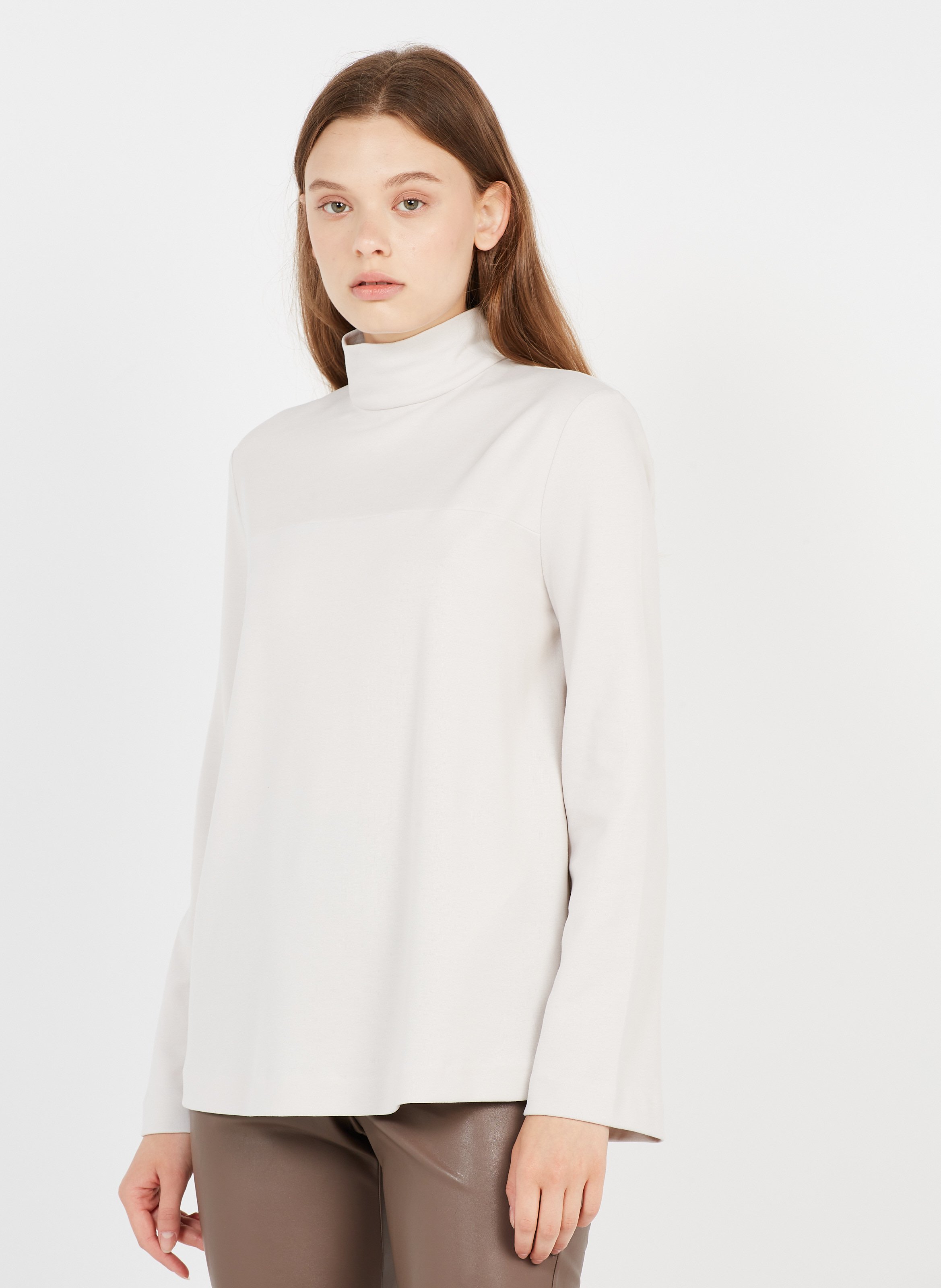 beige high neck top