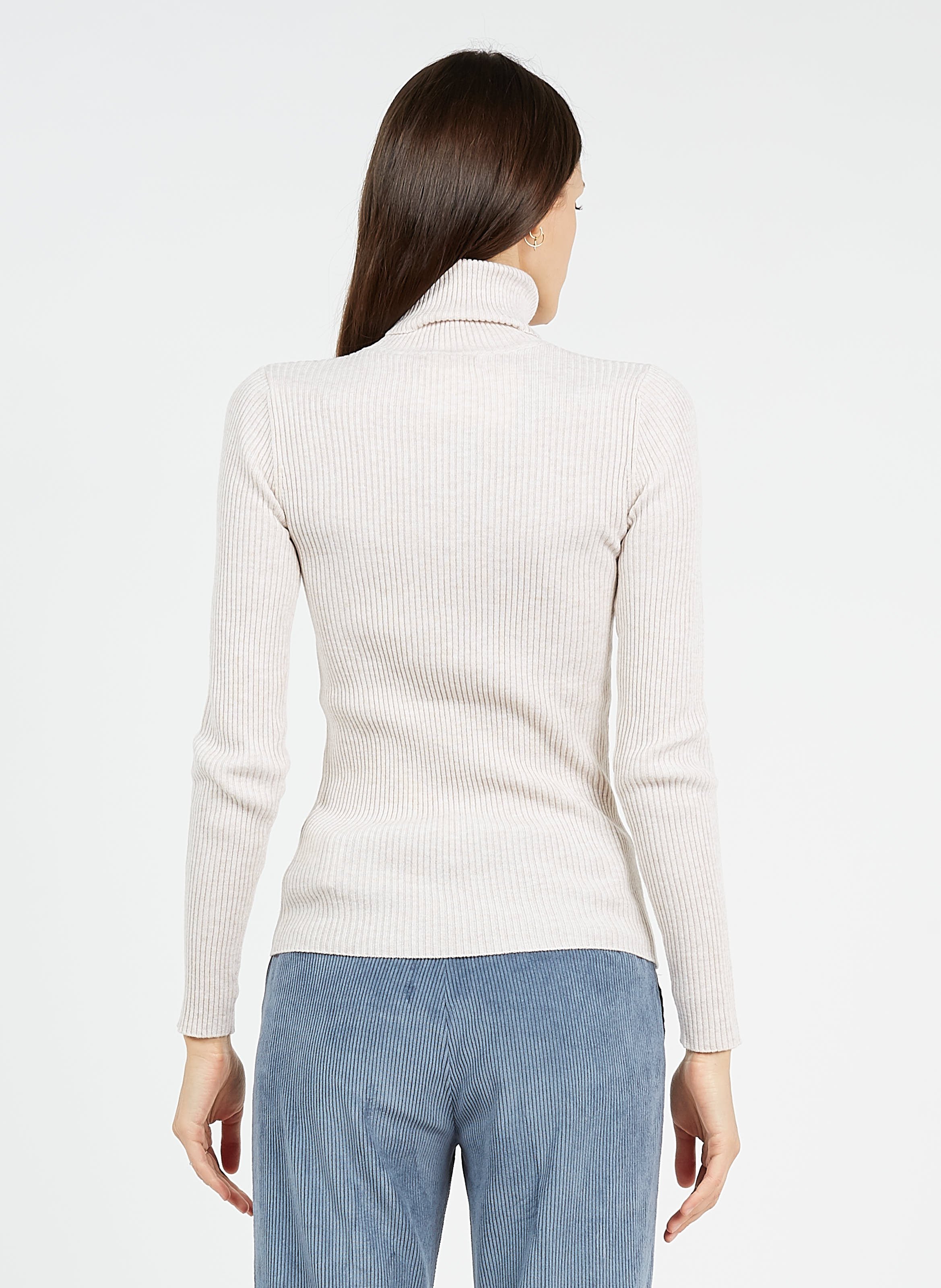 white ribbed turtleneck sweater