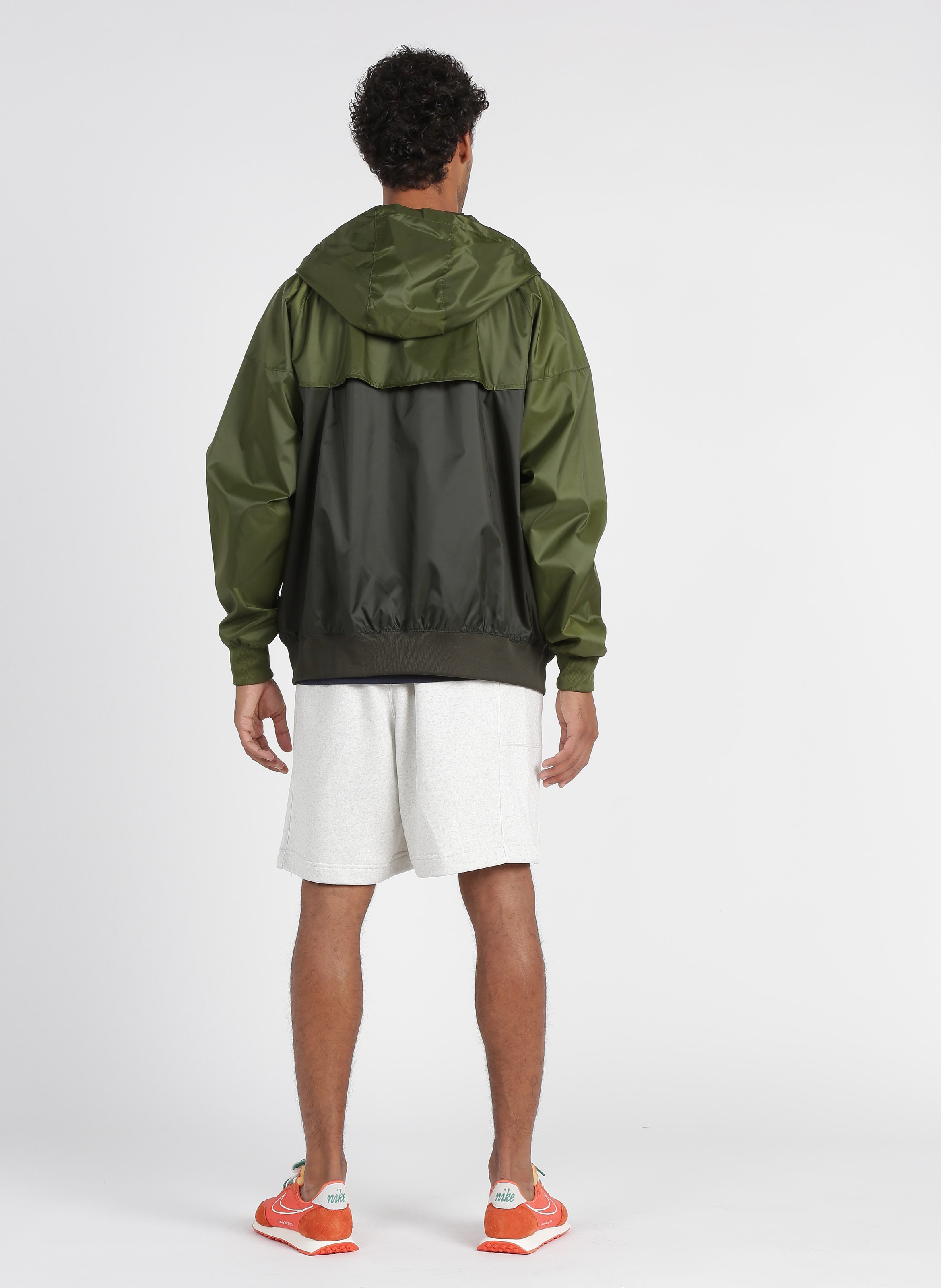 green windbreaker jacket
