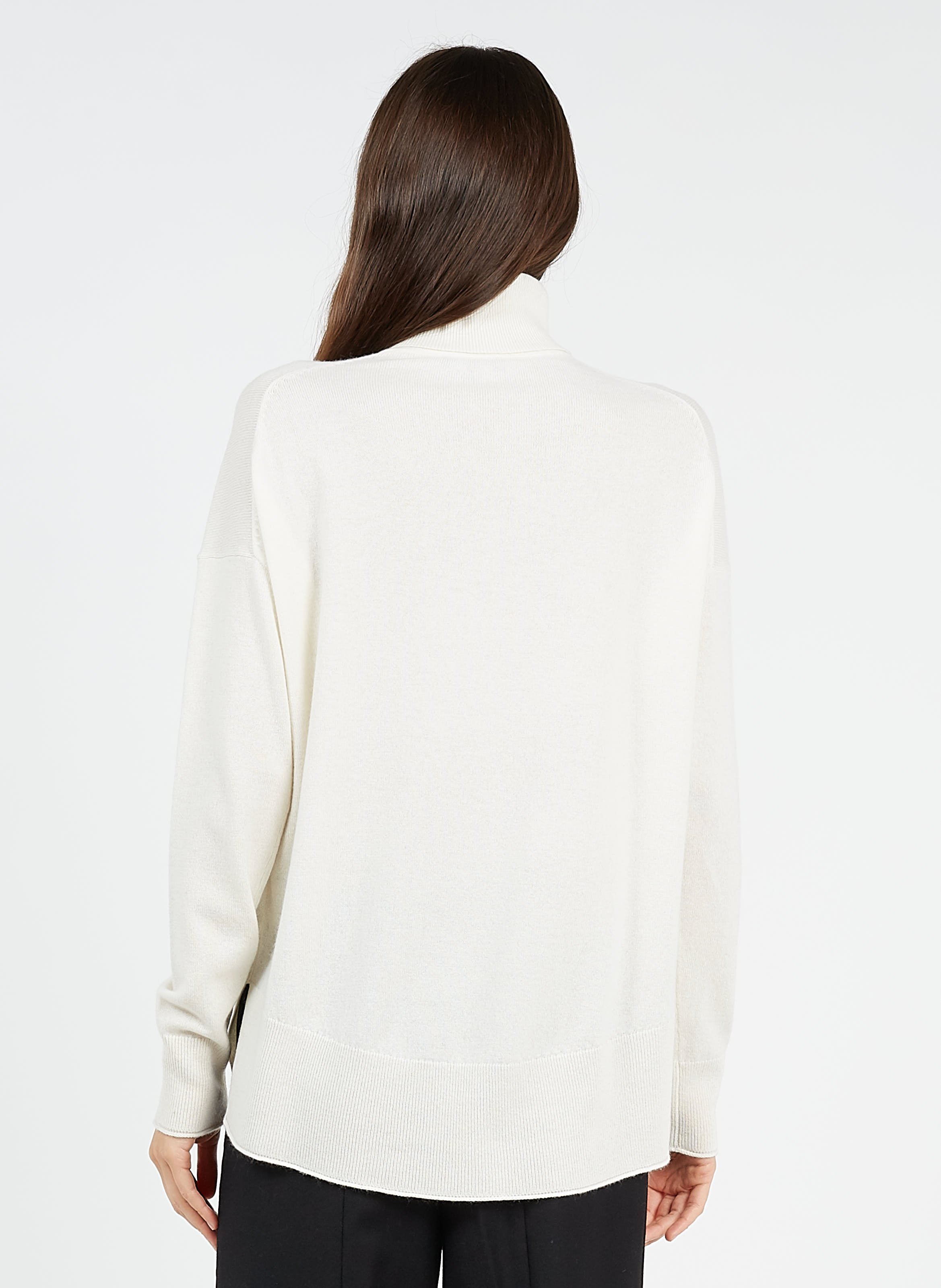 fluffy white turtleneck