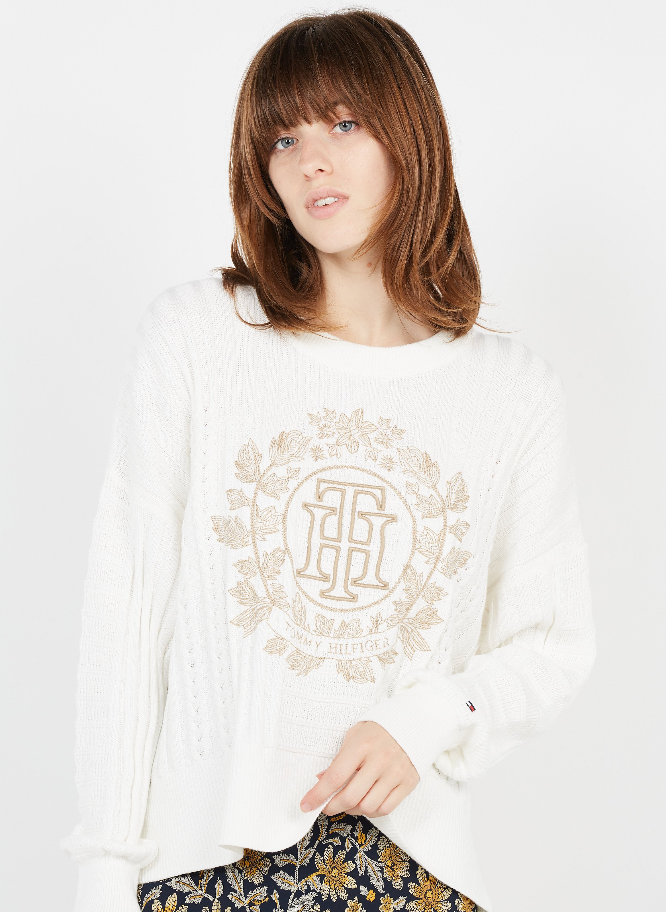 white embroidered sweater