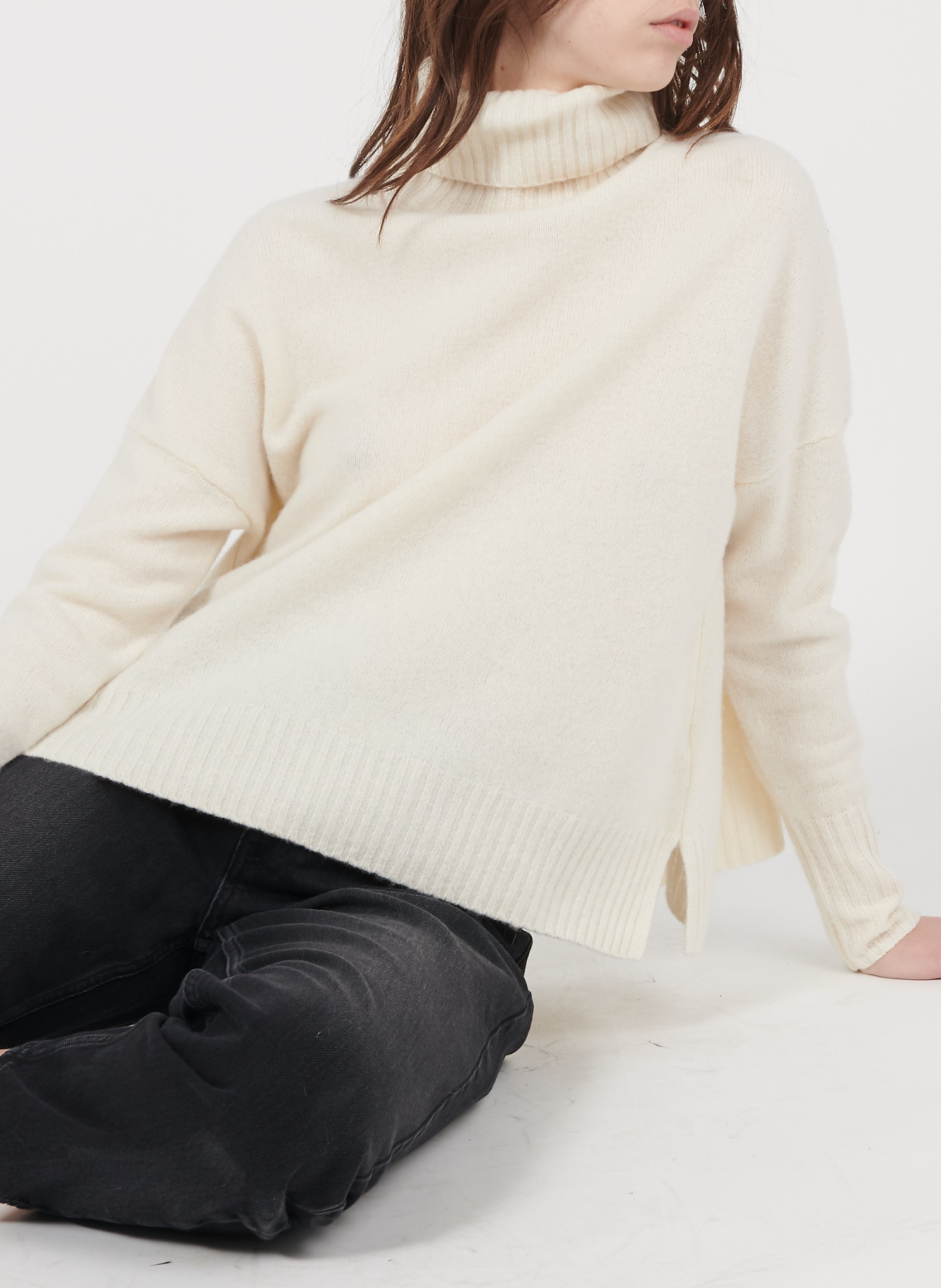 white jumper turtleneck