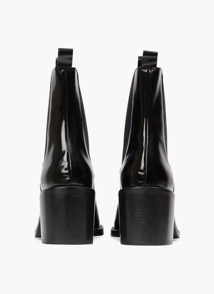 Chelsea boots talon en cuir Noir