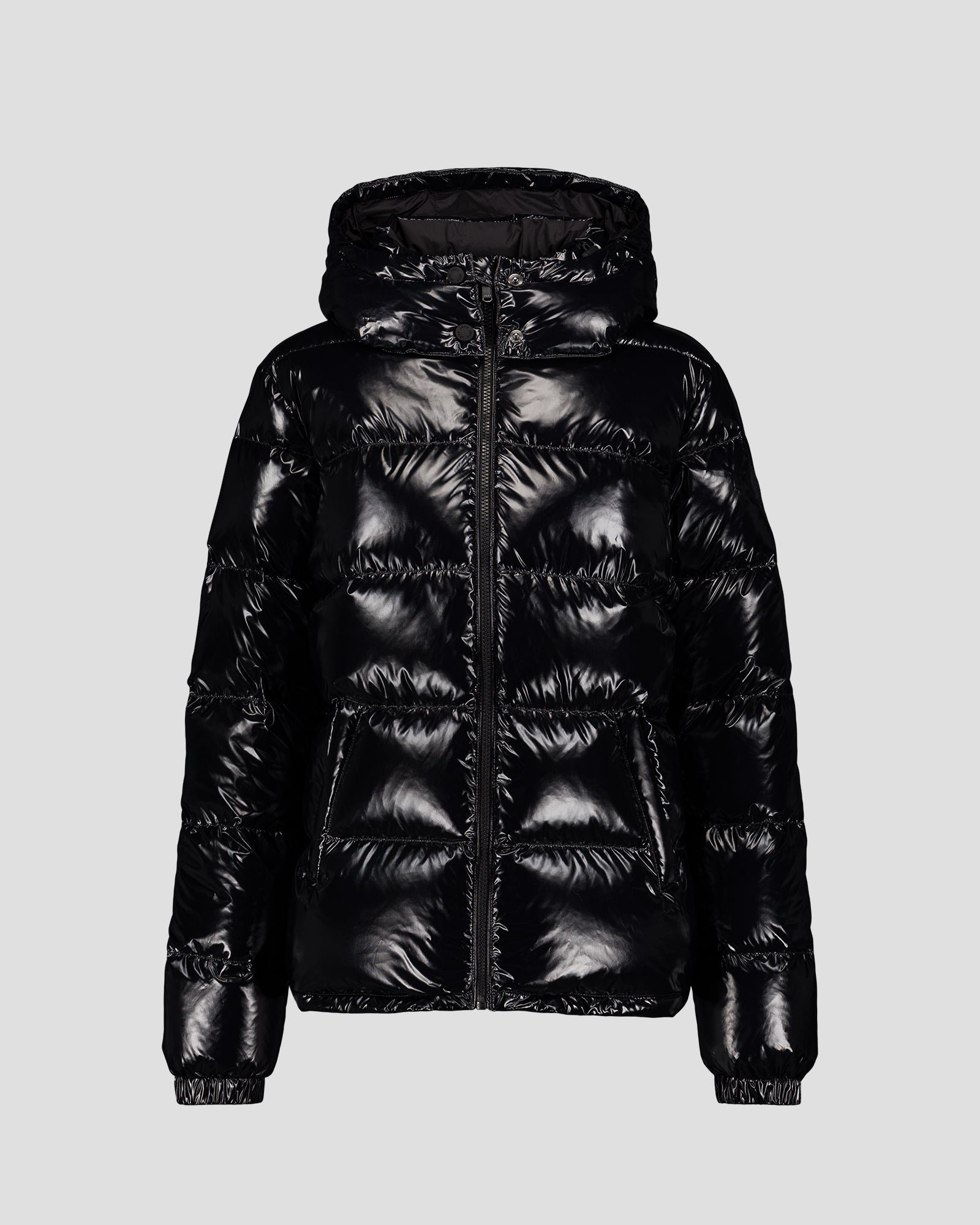 Puffer jacket for extreme cold with a glossy finish inspired by Prague. JOTT Black