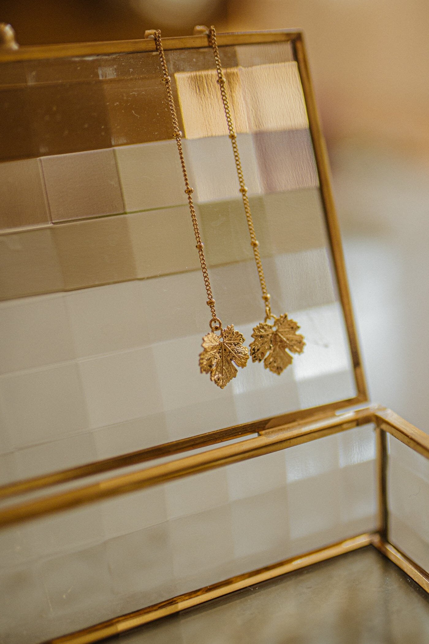 Silver-plated hanging leaf earrings MONSIEUR SIMONE Golden