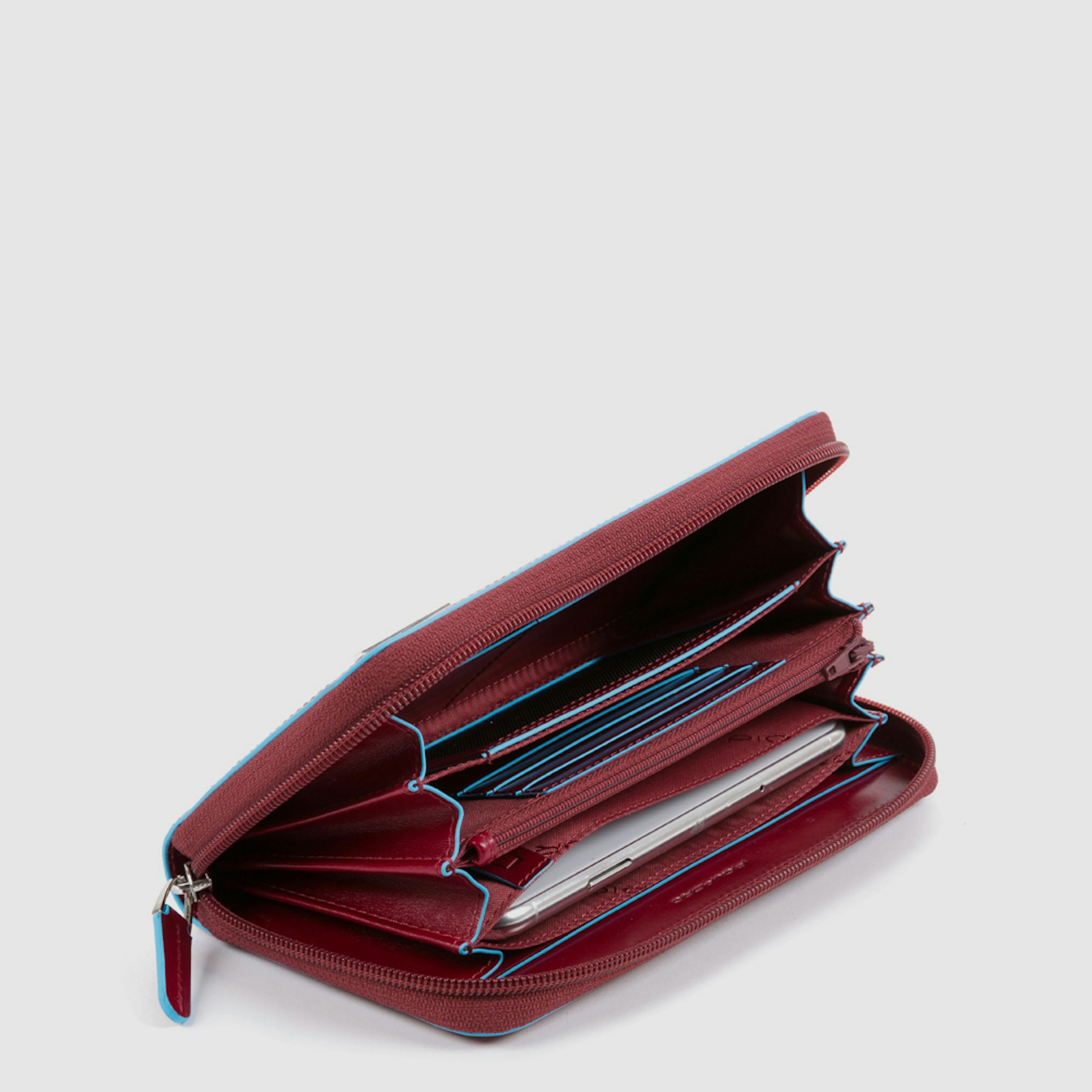 Zip-around wallet with 4 compartments in leather PIQUADRO Red