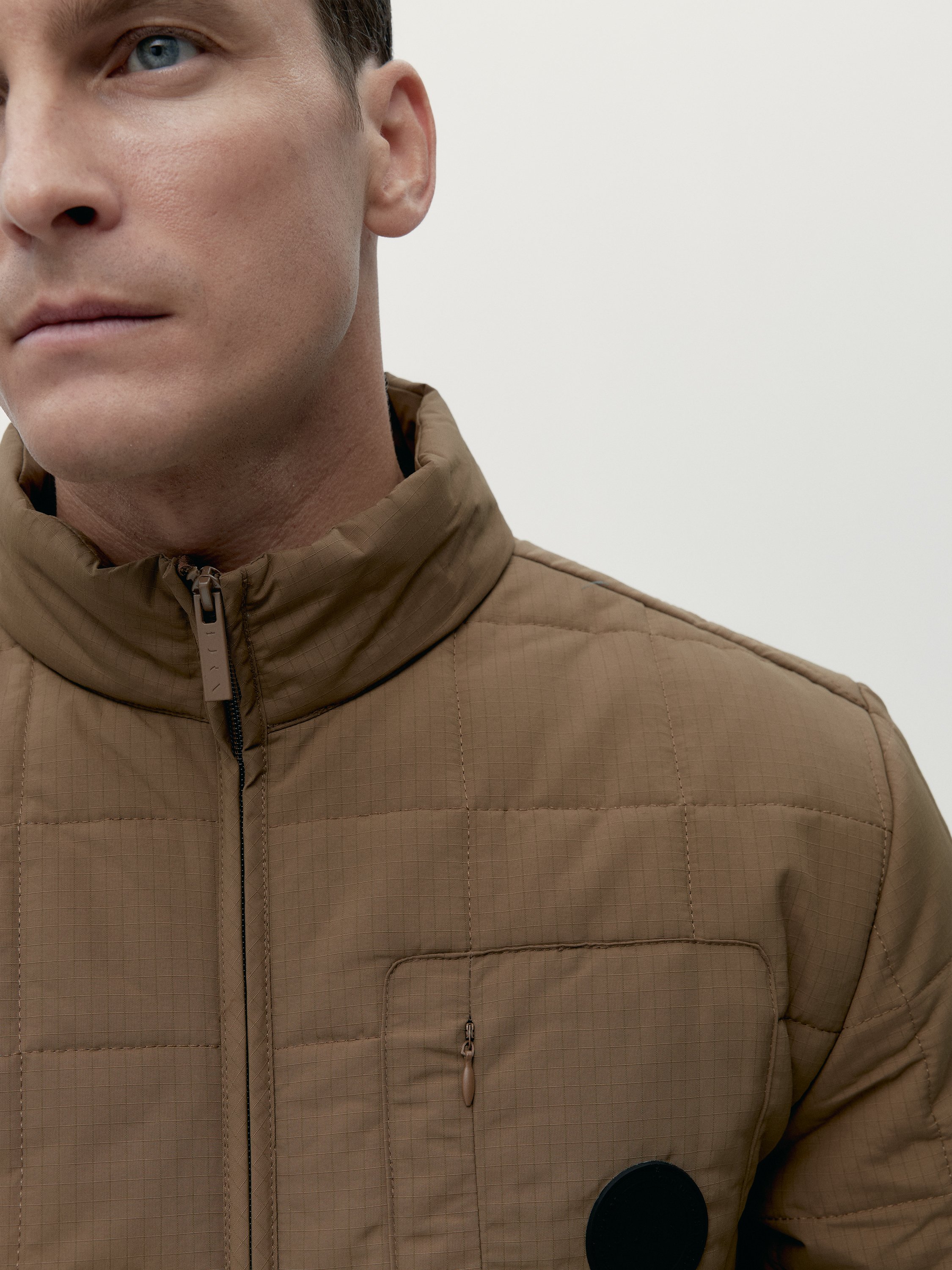 Quilted sports jacket with zipper BORN LIVING YOGA Brown