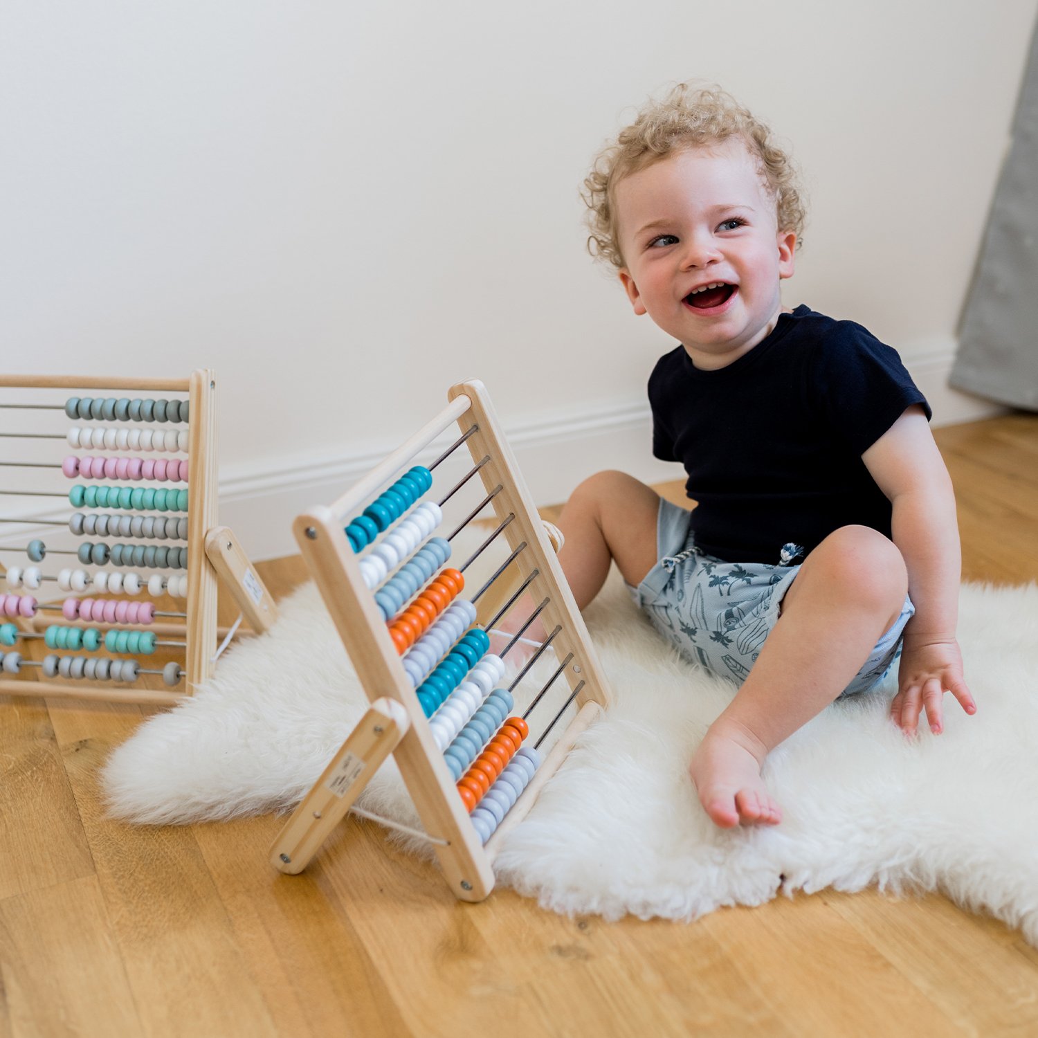 Wooden abacus with 100 coloured beads KINDSGUT White