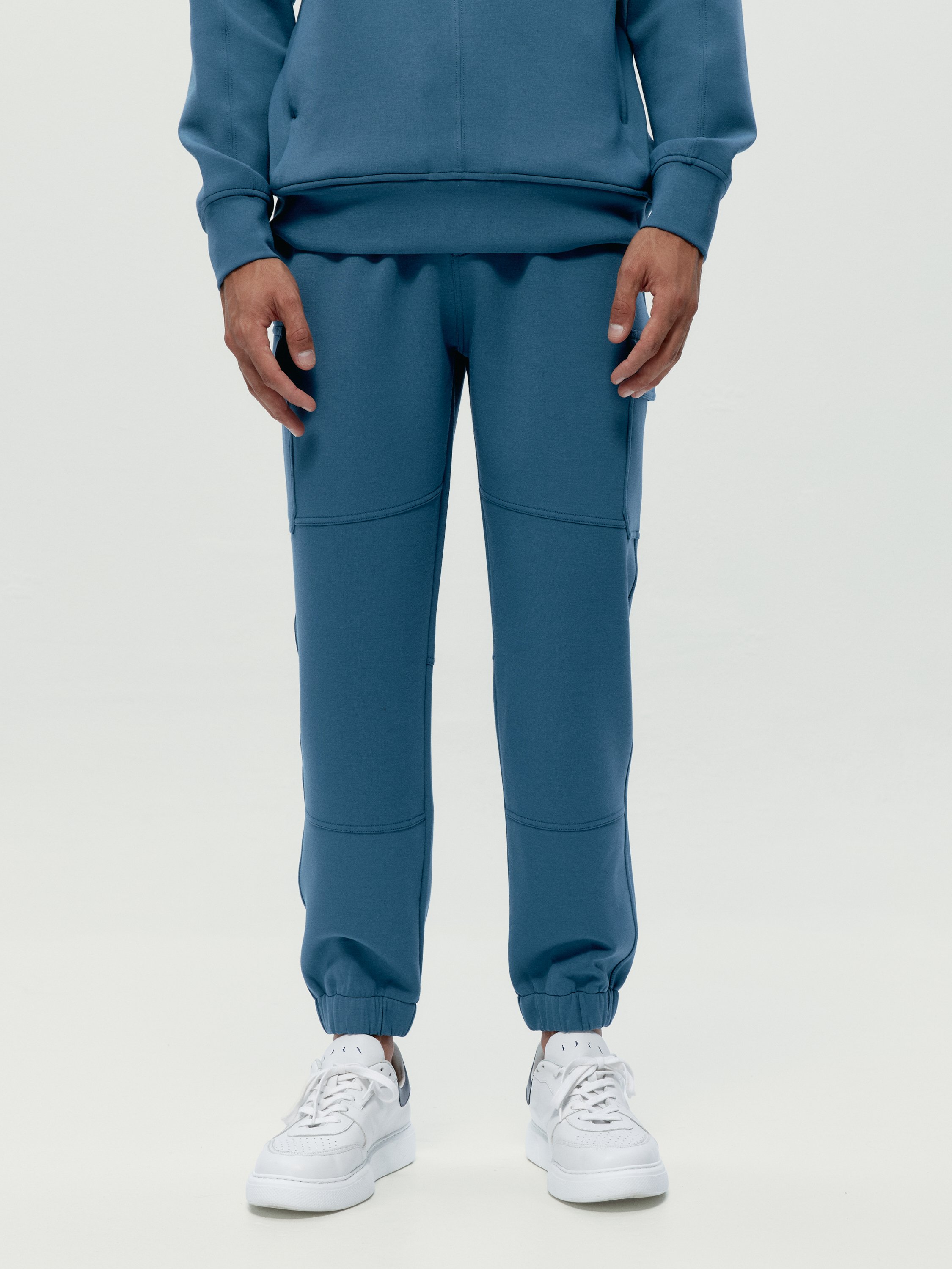 Pantalon de sport performance athleisure grau BORN Bleu