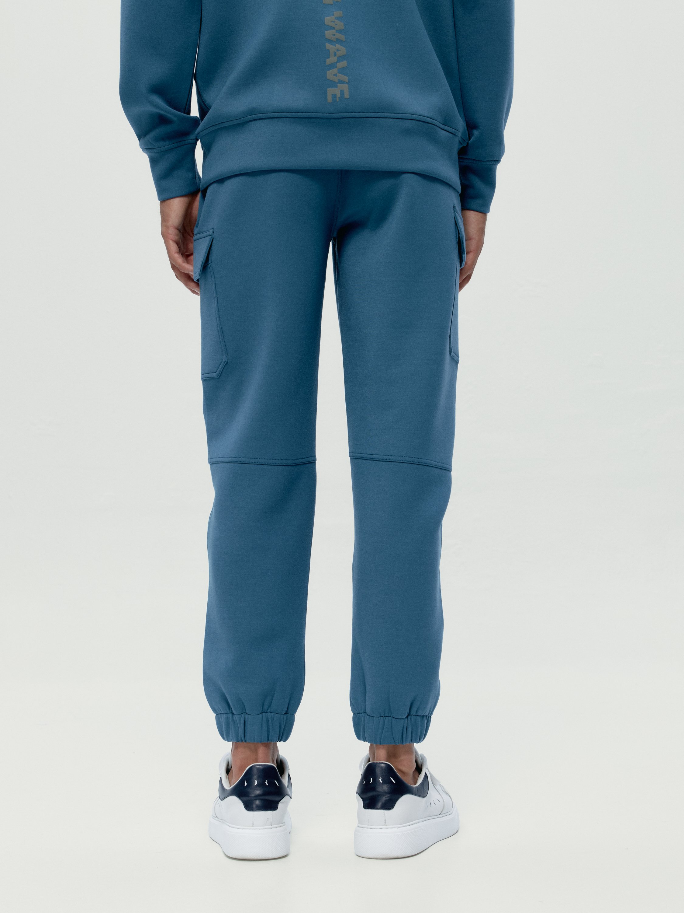 Pantalon de sport performance athleisure grau BORN Bleu