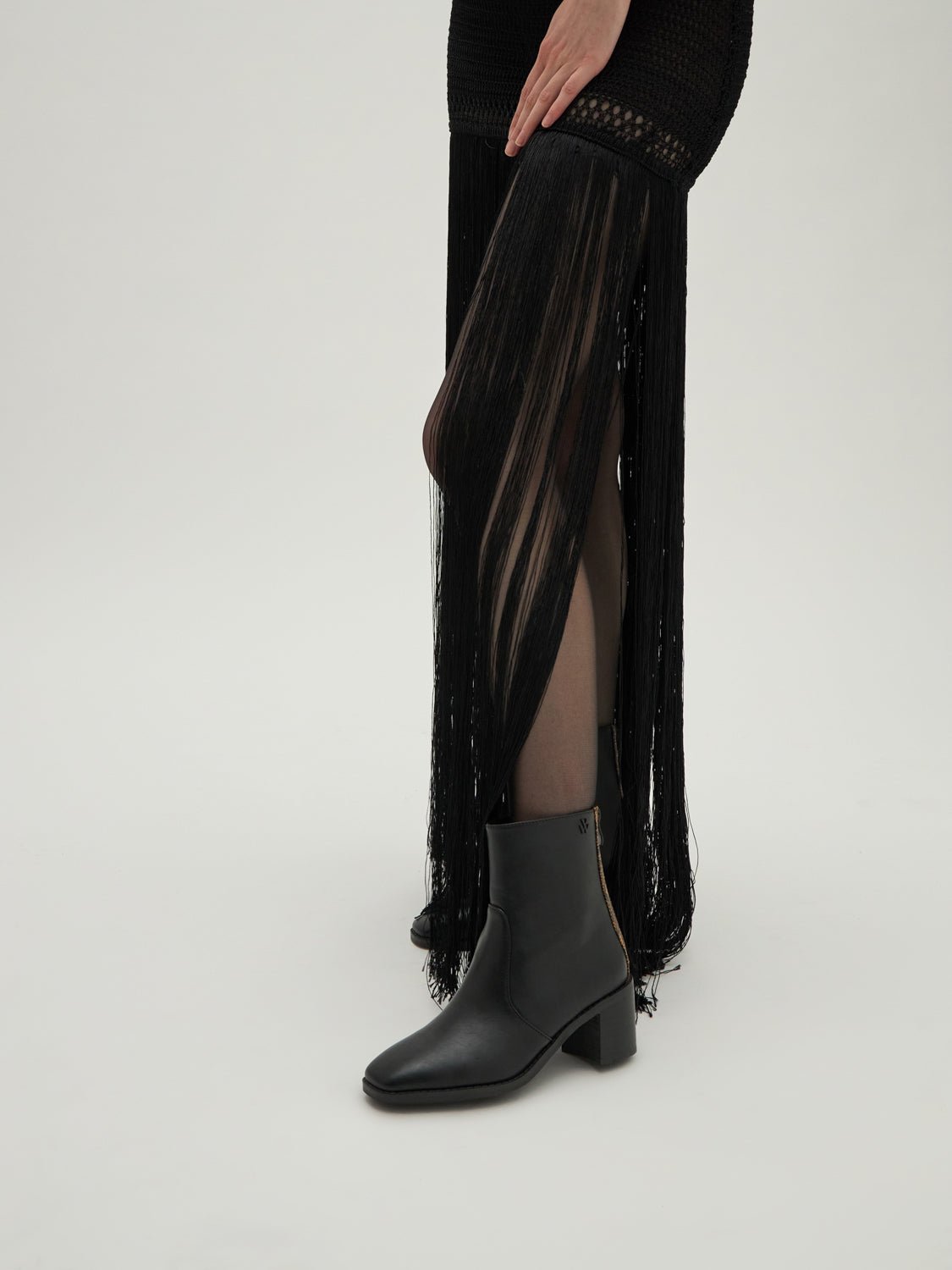 Bottines léopard à talon Noir