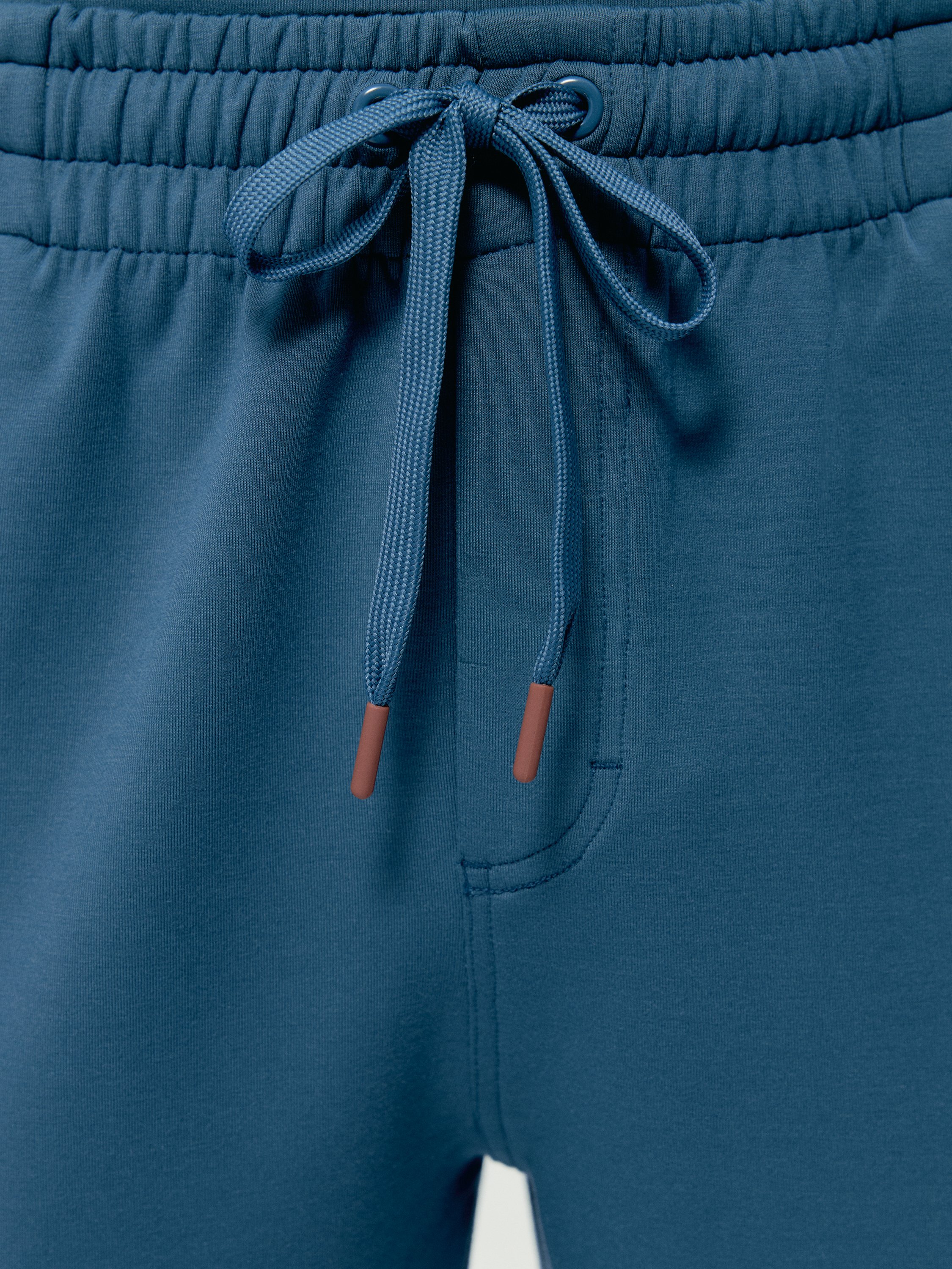 Pantalon de sport performance athleisure grau BORN Bleu