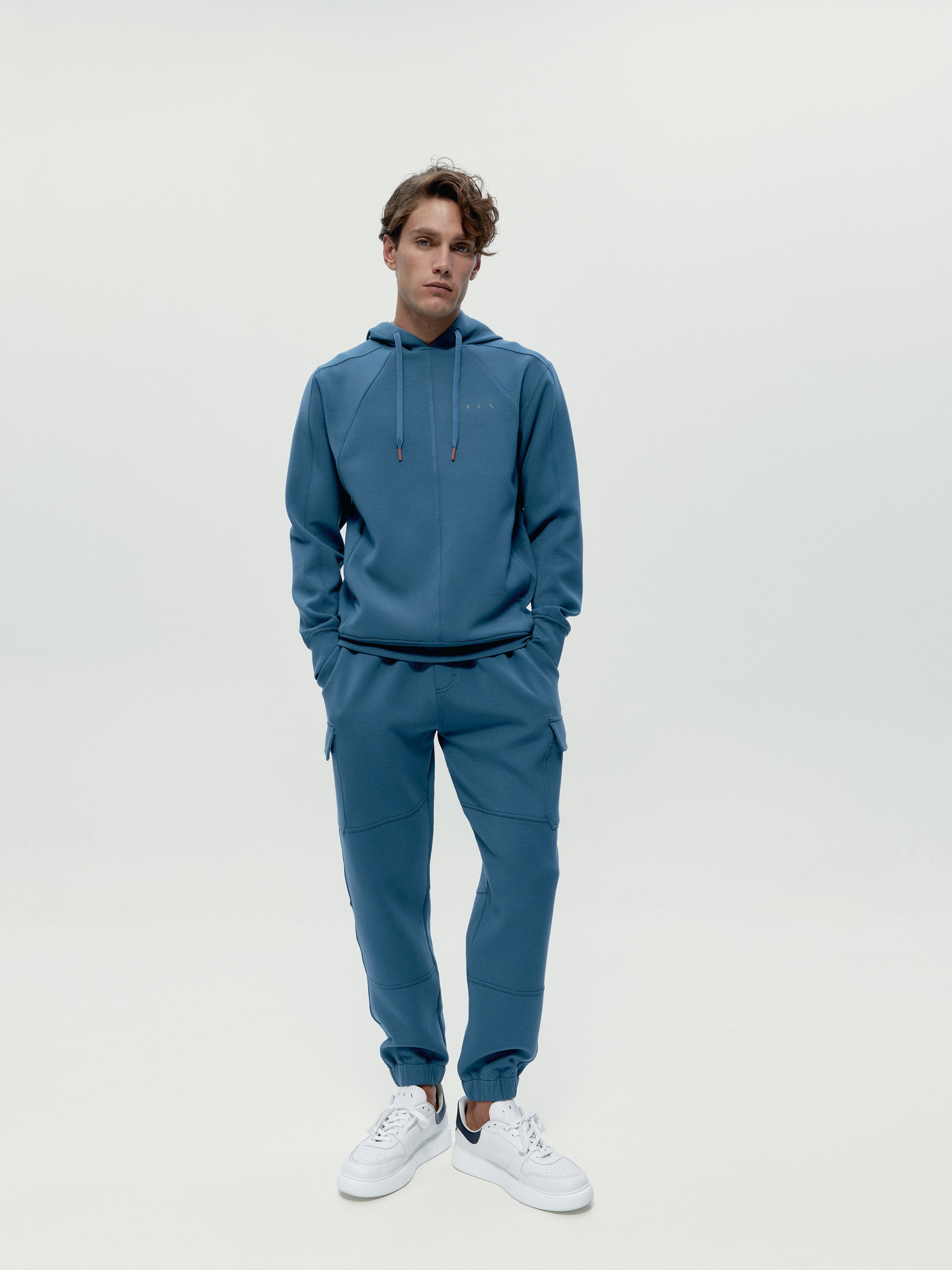 Pantalon de sport performance athleisure grau BORN Bleu