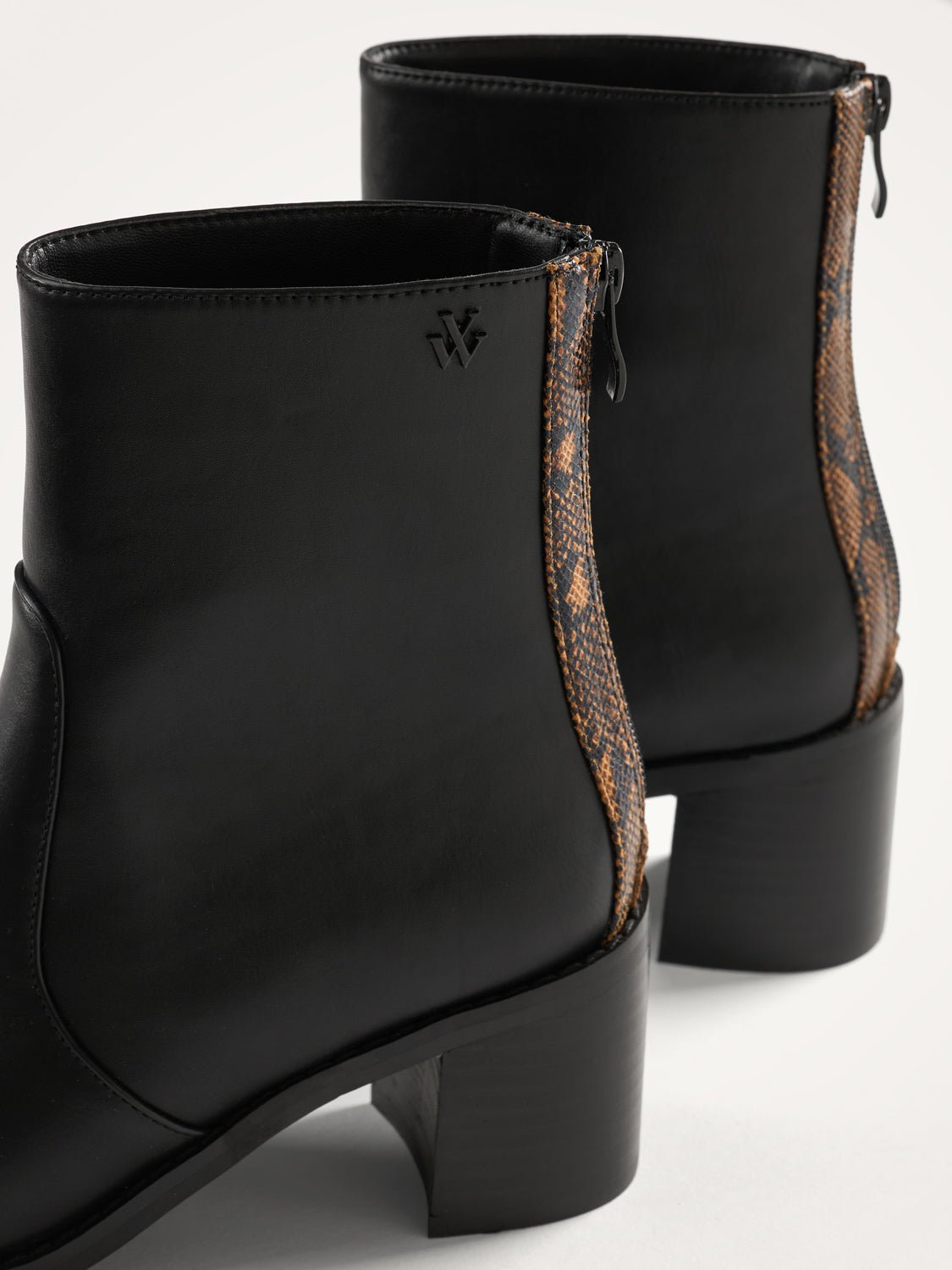 Bottines léopard à talon Noir