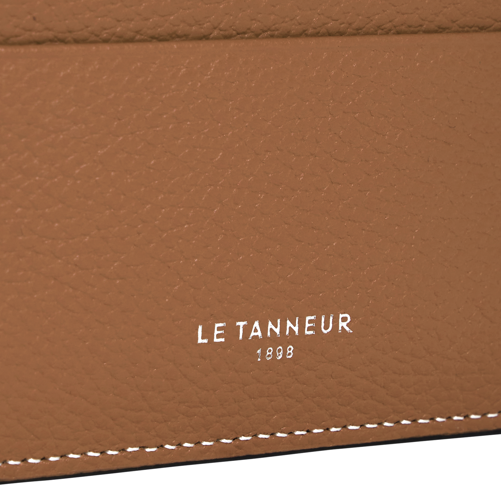 - 100 % Leder, - 6 Kartenschlitze, - 1 zentrale Tasche, - Maße: B10 x H7 cm. LE TANNEUR Braun