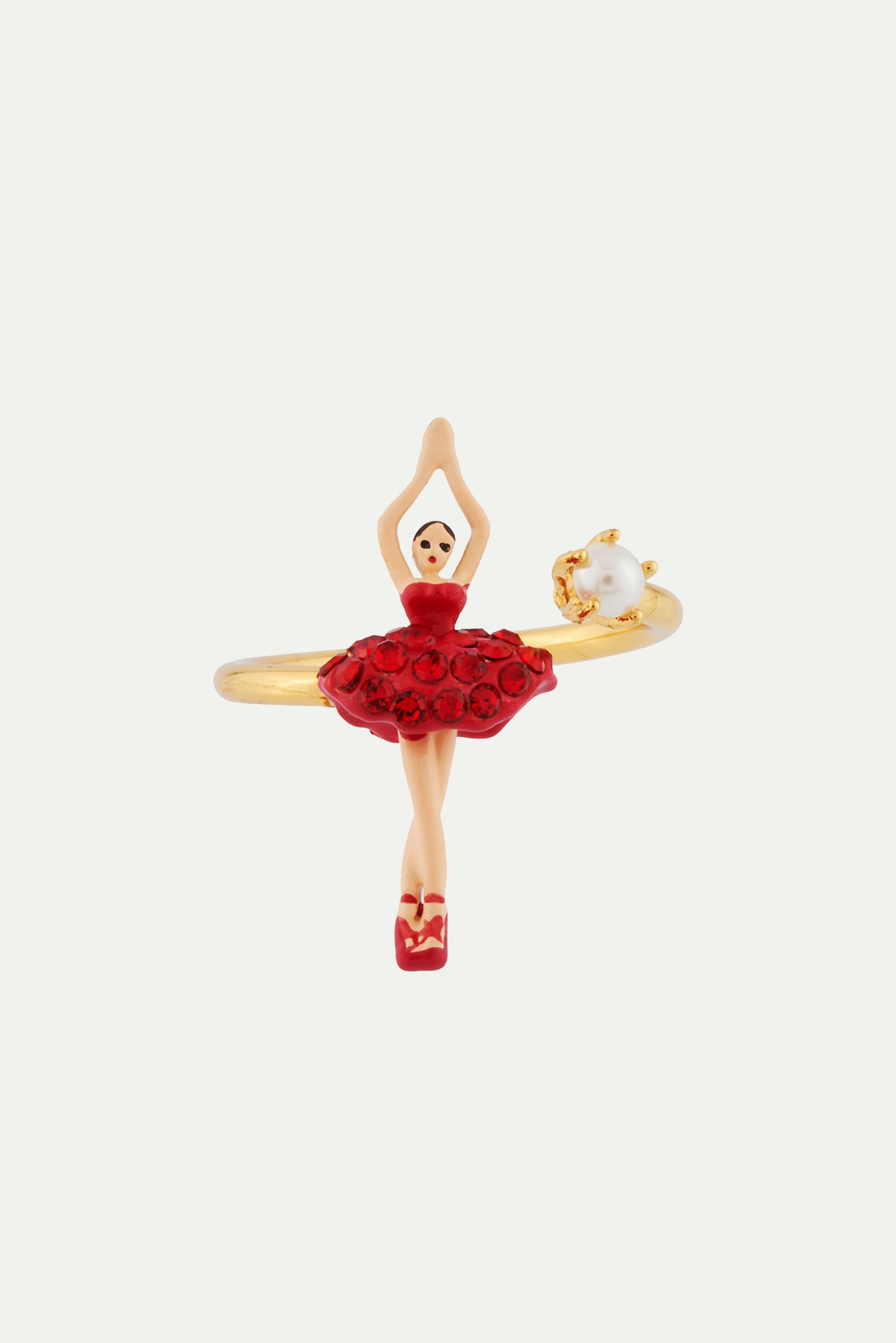 Adjustable ring featuring a mini ballerina in a tutu embellished with rhinestones. Red