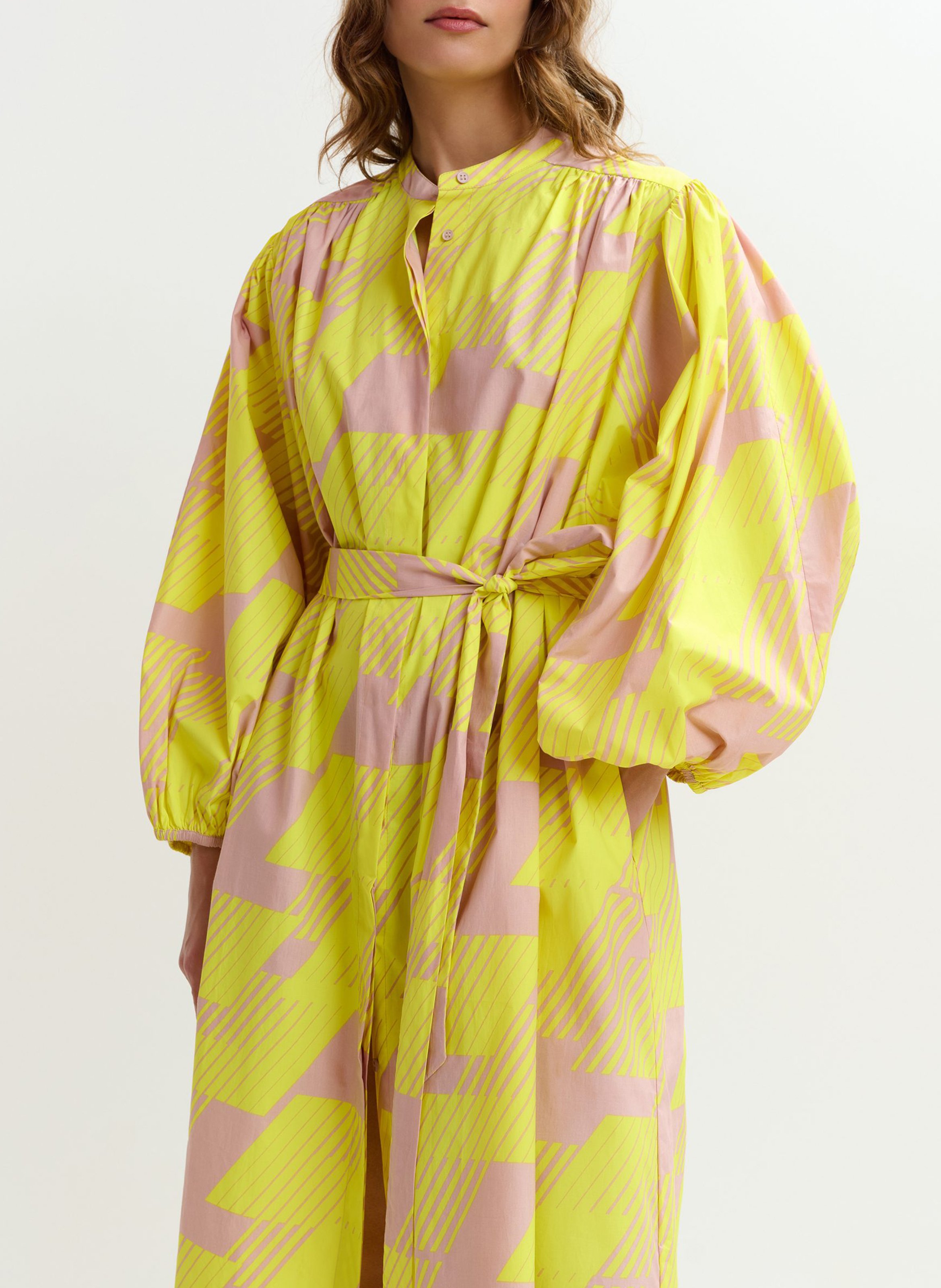 Loose fit midi dress with round neckline and belted waist. ESSENTIEL ANTWERP Yellow