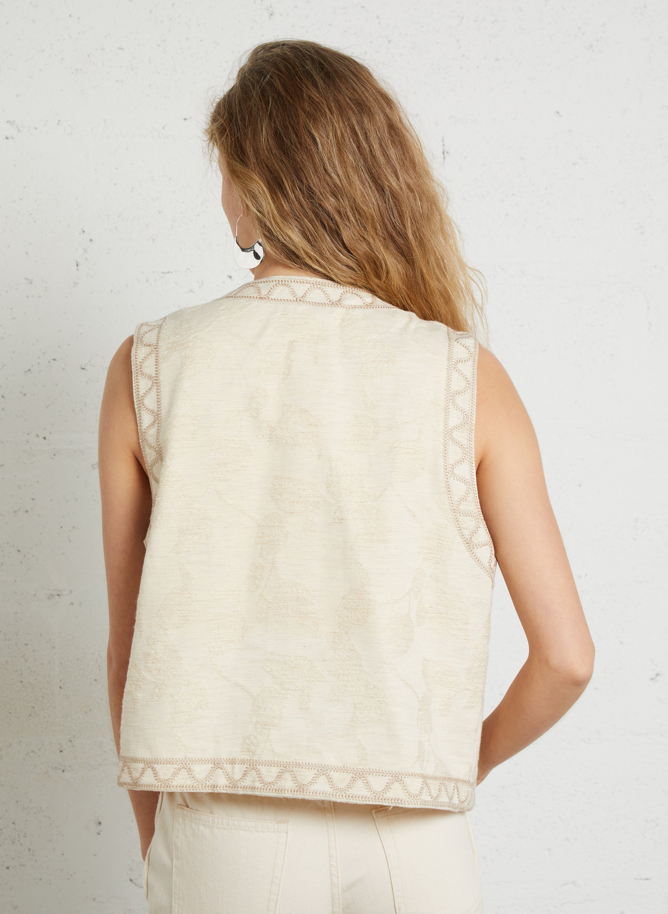Kort, mouwloos vest met borduurwerk THE KORNER Wit