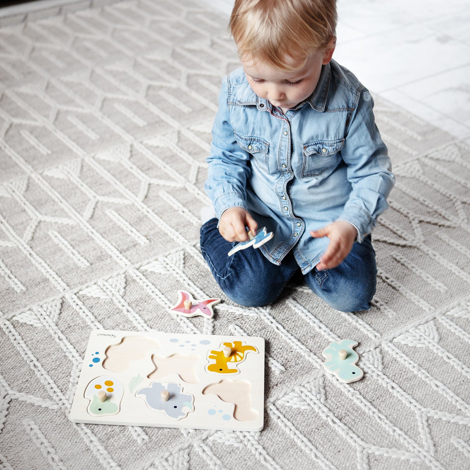 Dinosaur peg puzzle KINDSGUT Multicolored