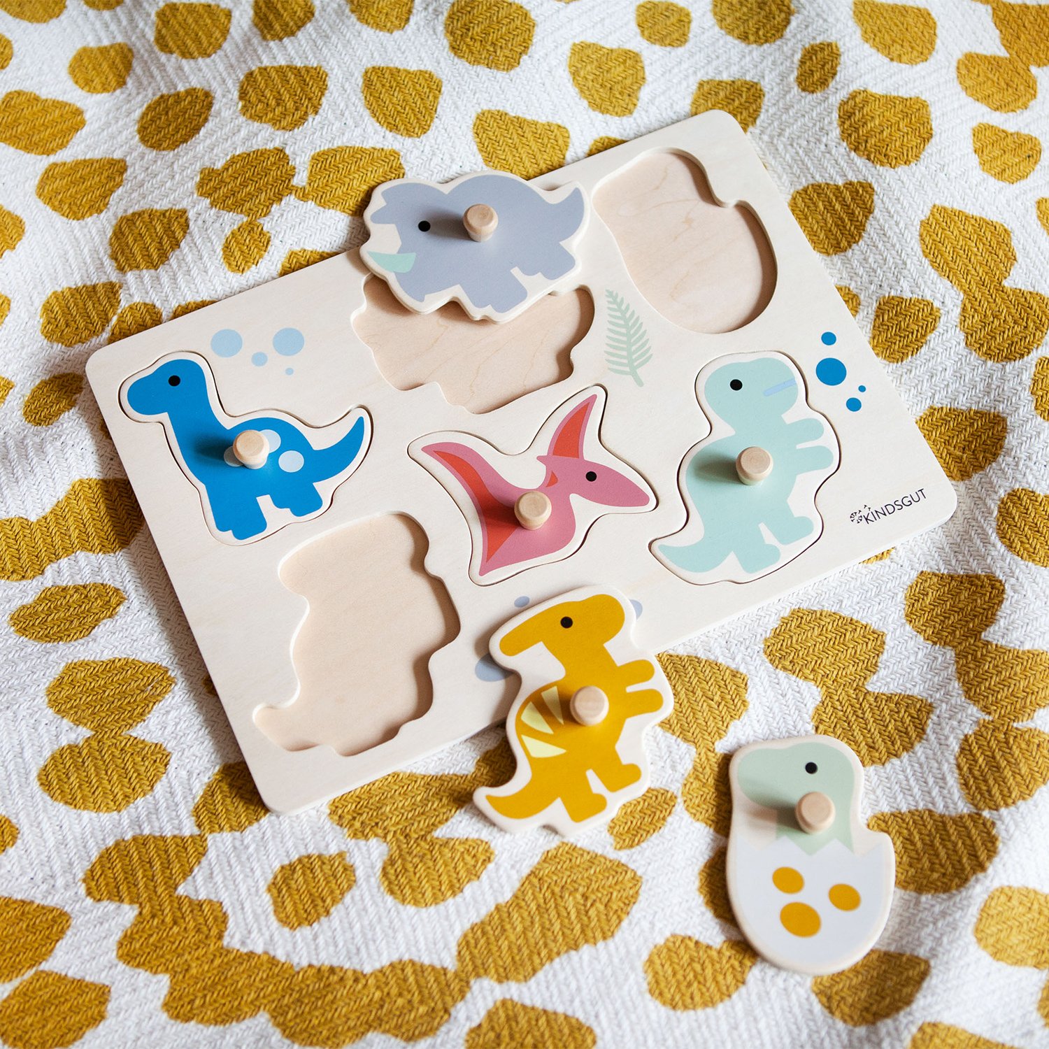 Dinosaur peg puzzle KINDSGUT Multicolored
