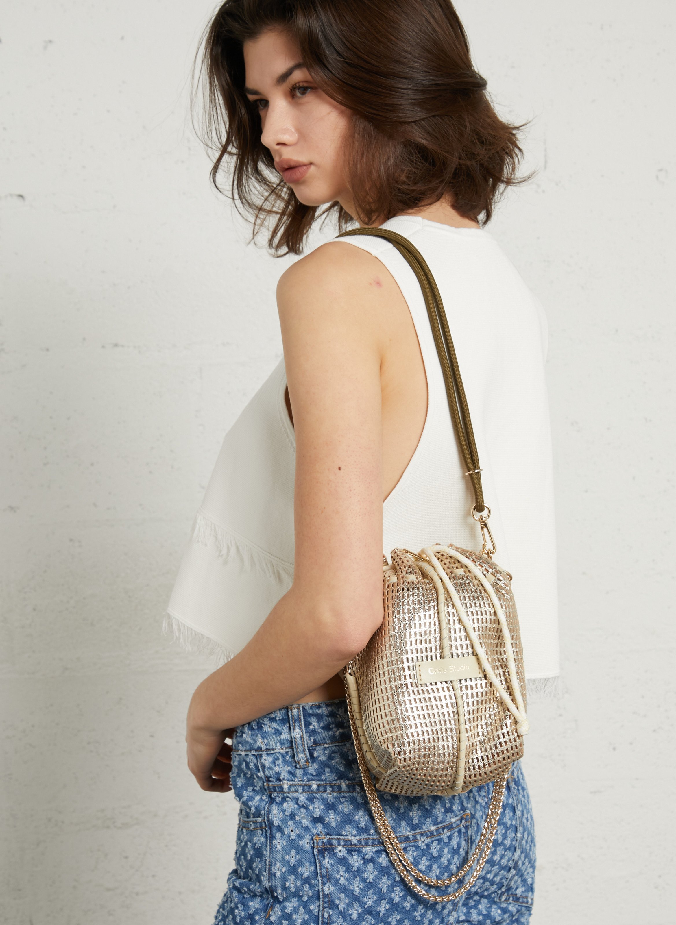 Perforated leather bucket bag CRAIE STUDIO Golden