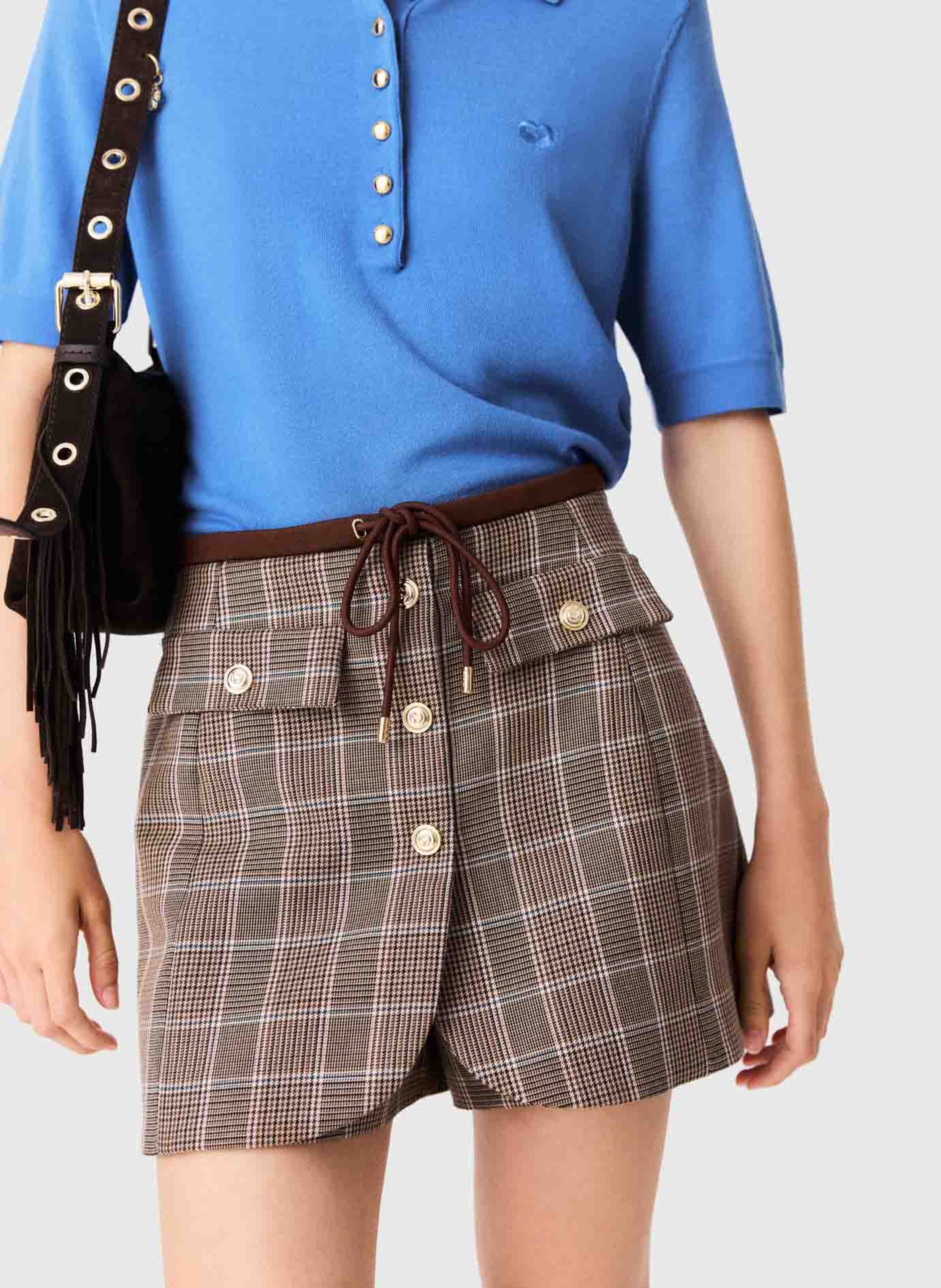 Korte tailleure met rok-effect in motieven. MAJE Bruin