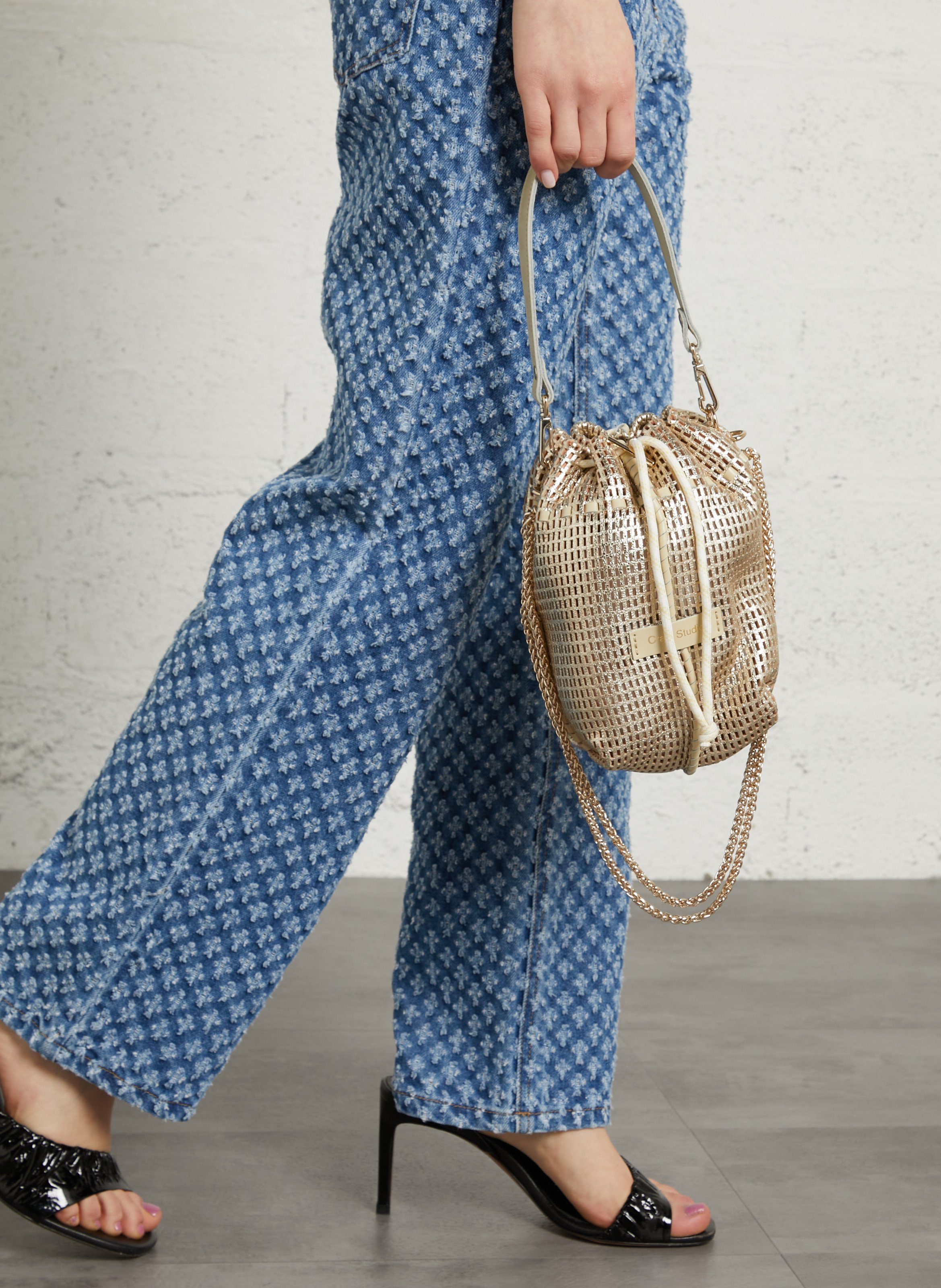 Perforated leather bucket bag CRAIE STUDIO Golden