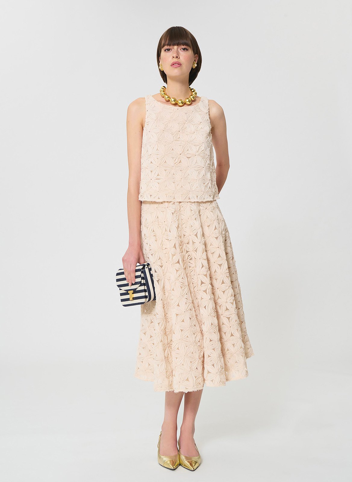 Top court sans manches à motif fleurs TARA JARMON Beige