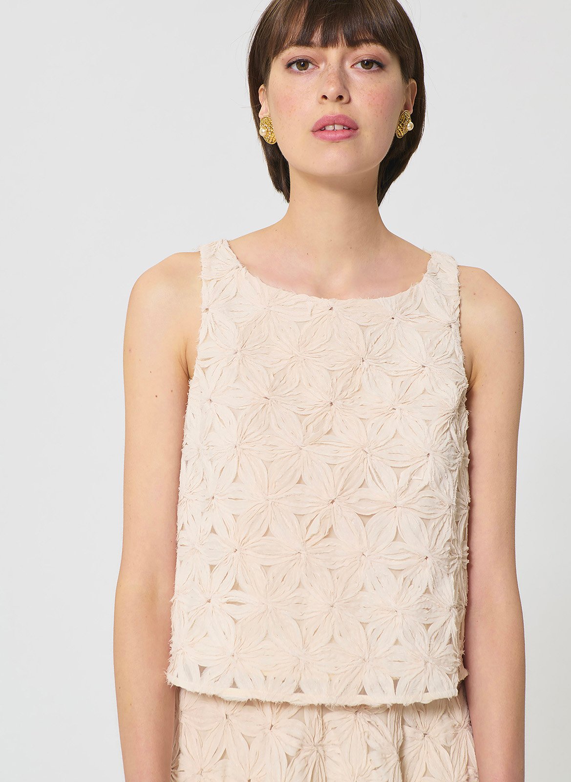 Top court sans manches à motif fleurs TARA JARMON Beige