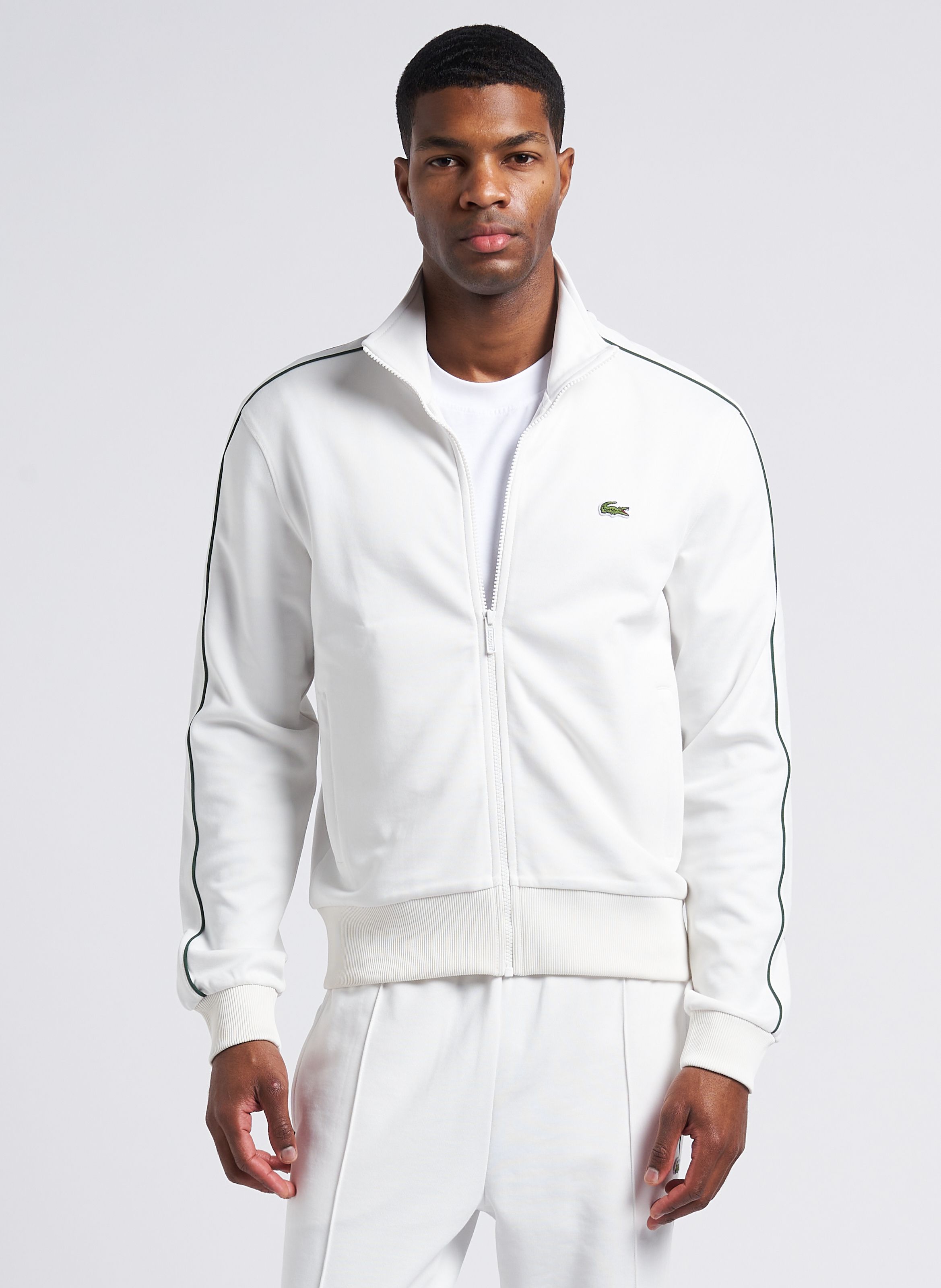 Veste lacoste verte et blanche sale