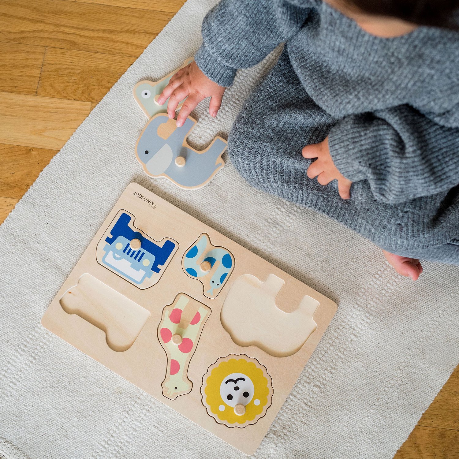 Wooden ocean peg puzzle KINDSGUT Red