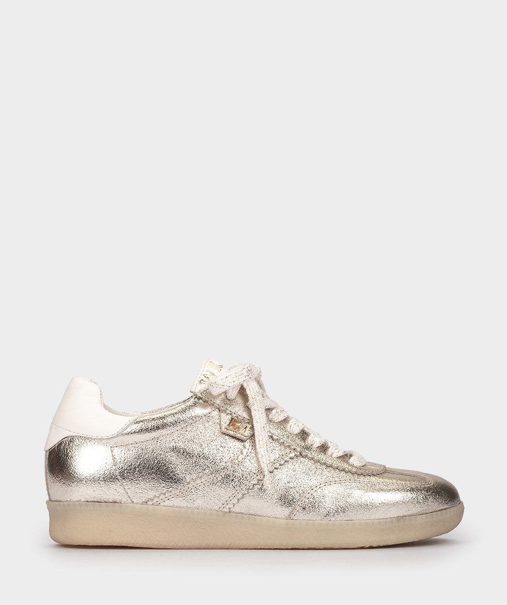 <p>Athletic shoes in metallic platinum leather</p> PEDRO MIRALLES Golden