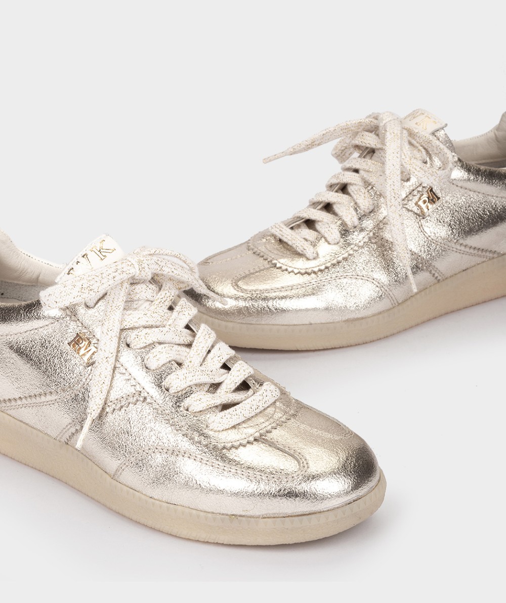 <p>Athletic shoes in metallic platinum leather</p> PEDRO MIRALLES Golden