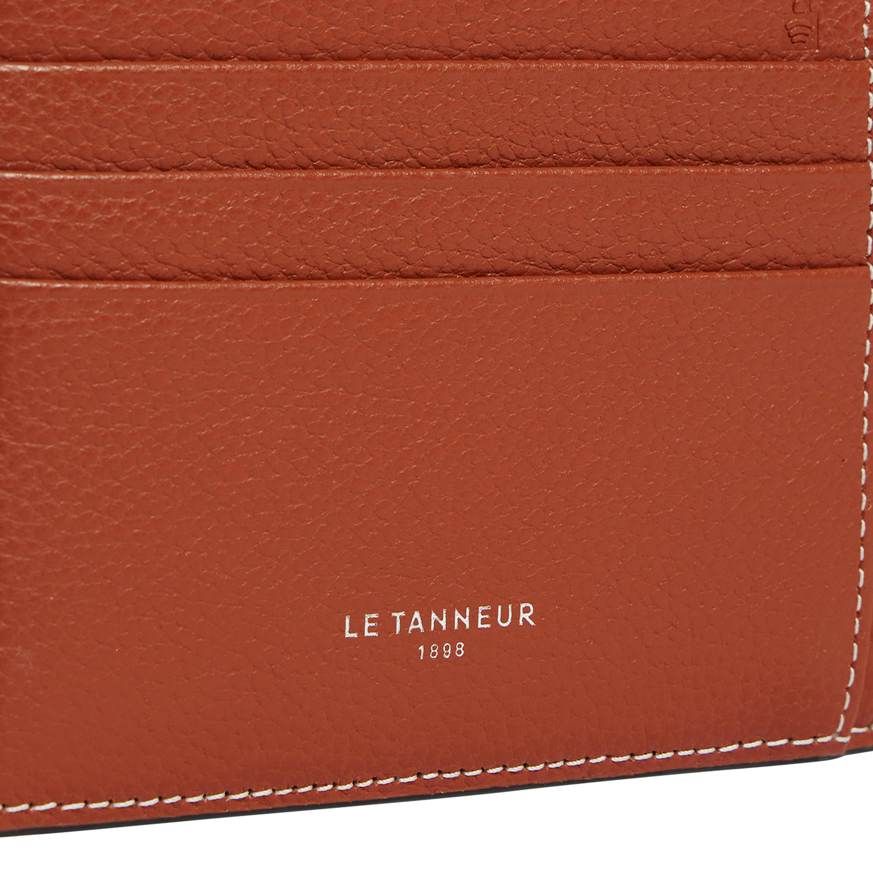 - 100 % Leder, - 6 Kartenschlitze, - 1 zentrale Tasche, - Maße: B10 x H7 cm. LE TANNEUR Braun