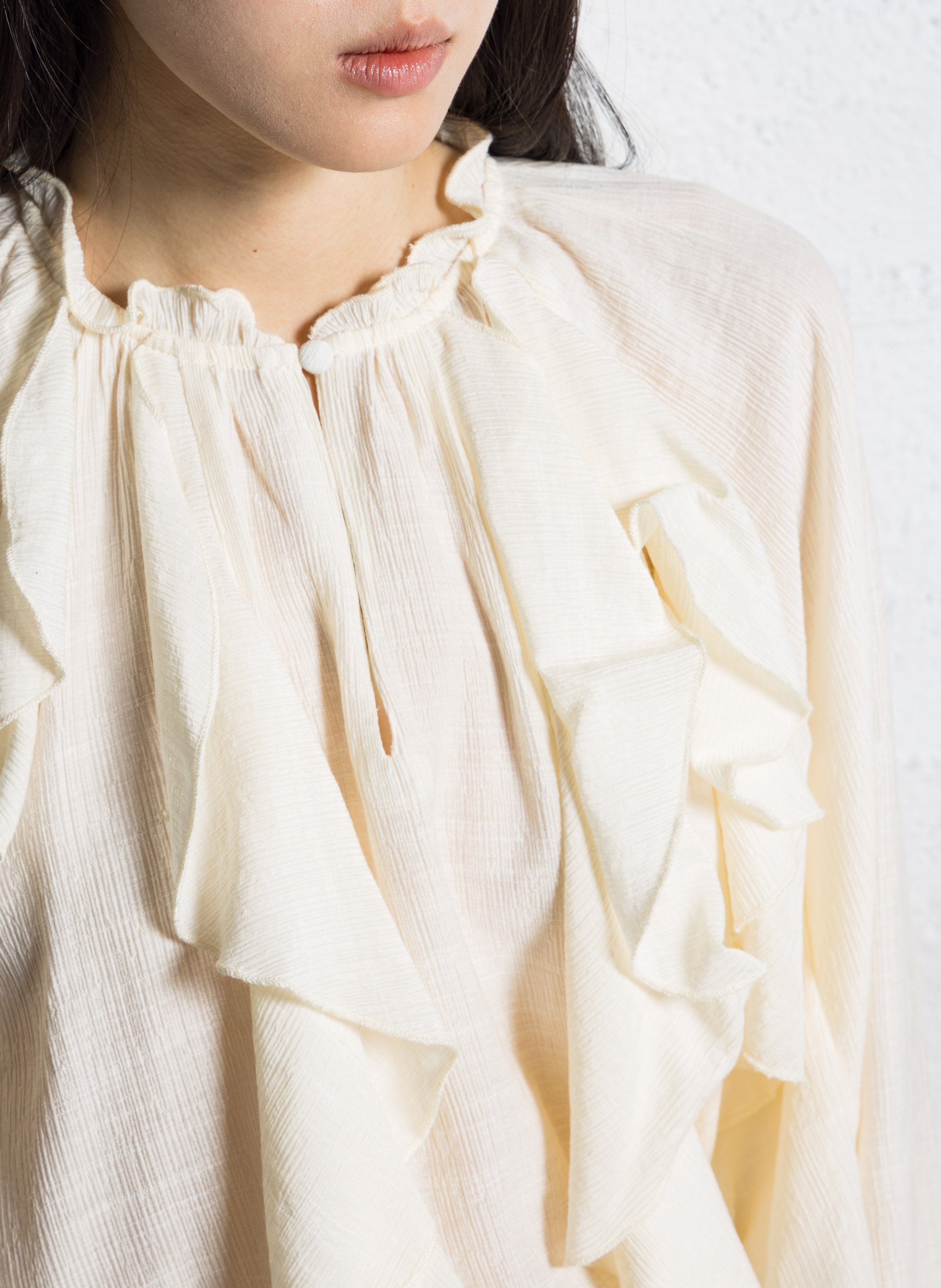 Flowy blouse with ruffled round neck. LA PETITE ETOILE Beige