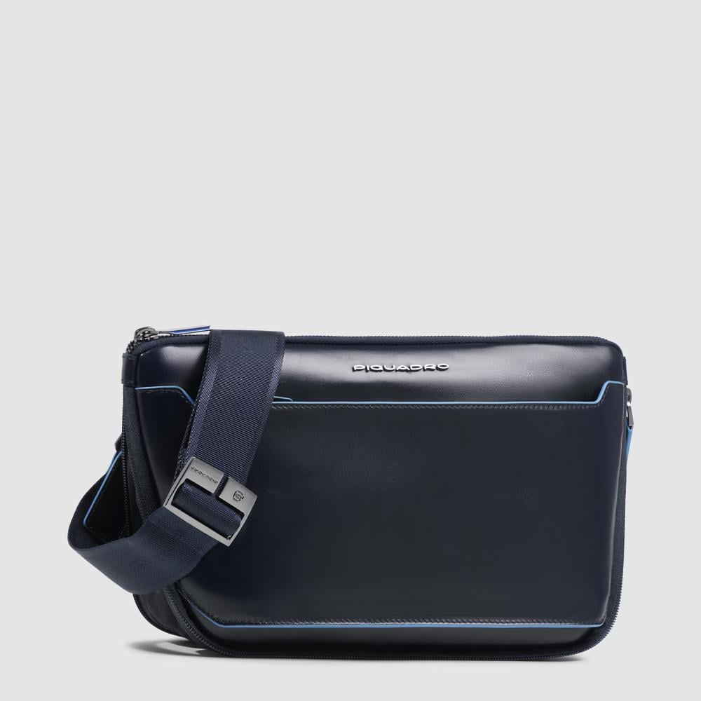 Flat expandable bum bag with repositionable shoulder strap attachments and pocket for airpods® PIQUADRO Blue