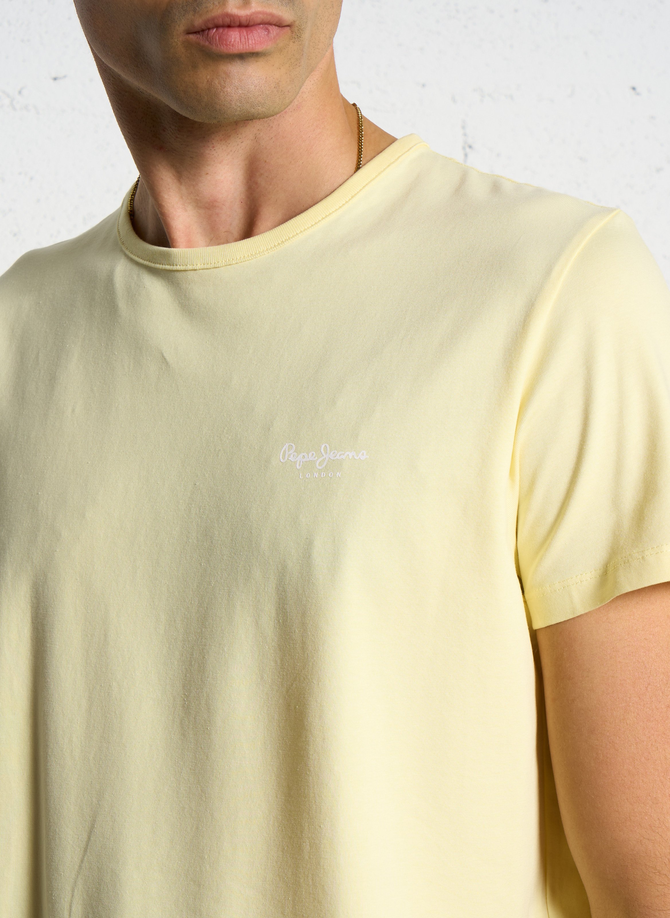 Solid straight t-shirt with chest logo. PEPE JEANS Yellow