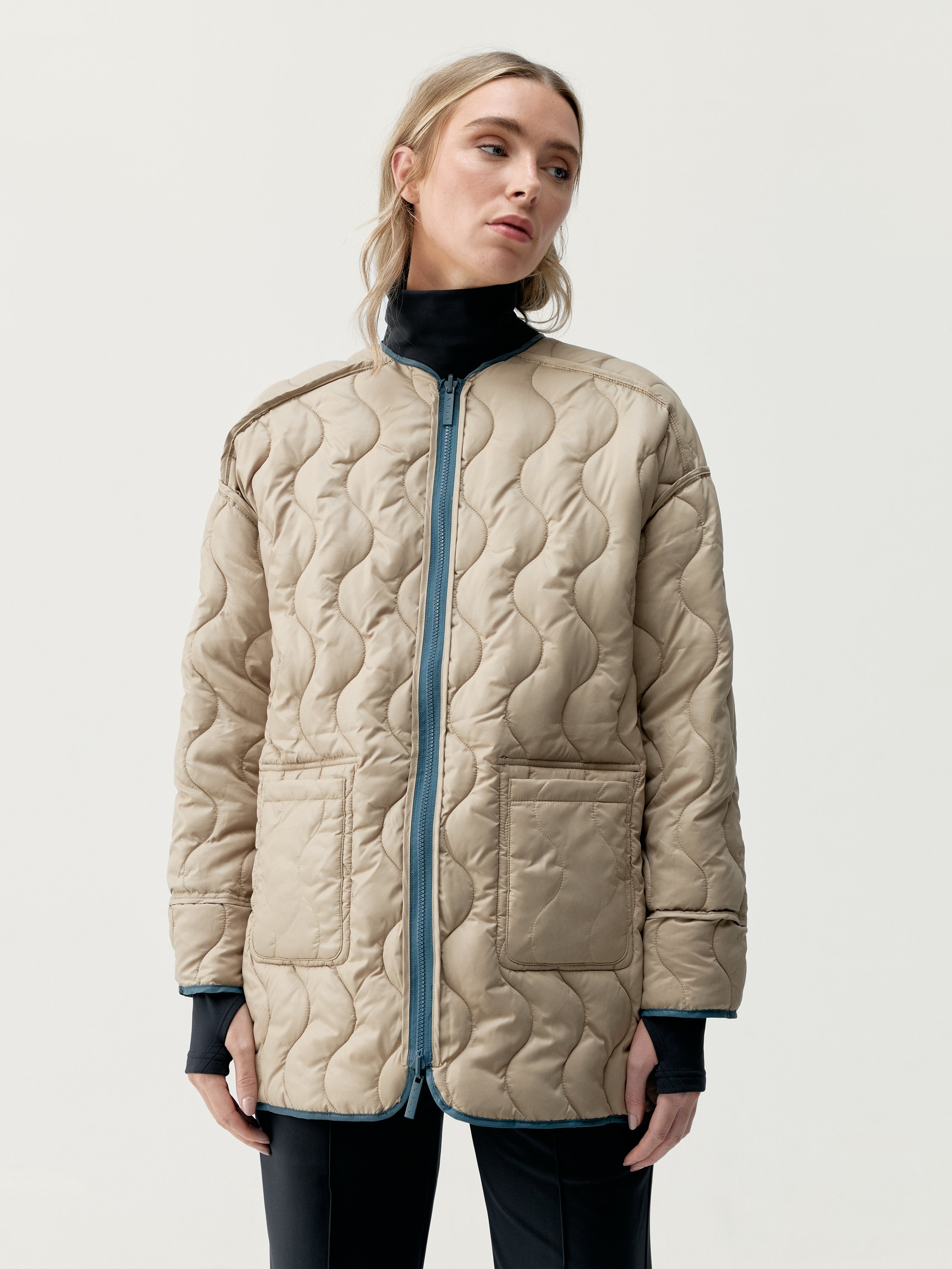 Quilted outer jacket BORN LIVING YOGA Blue