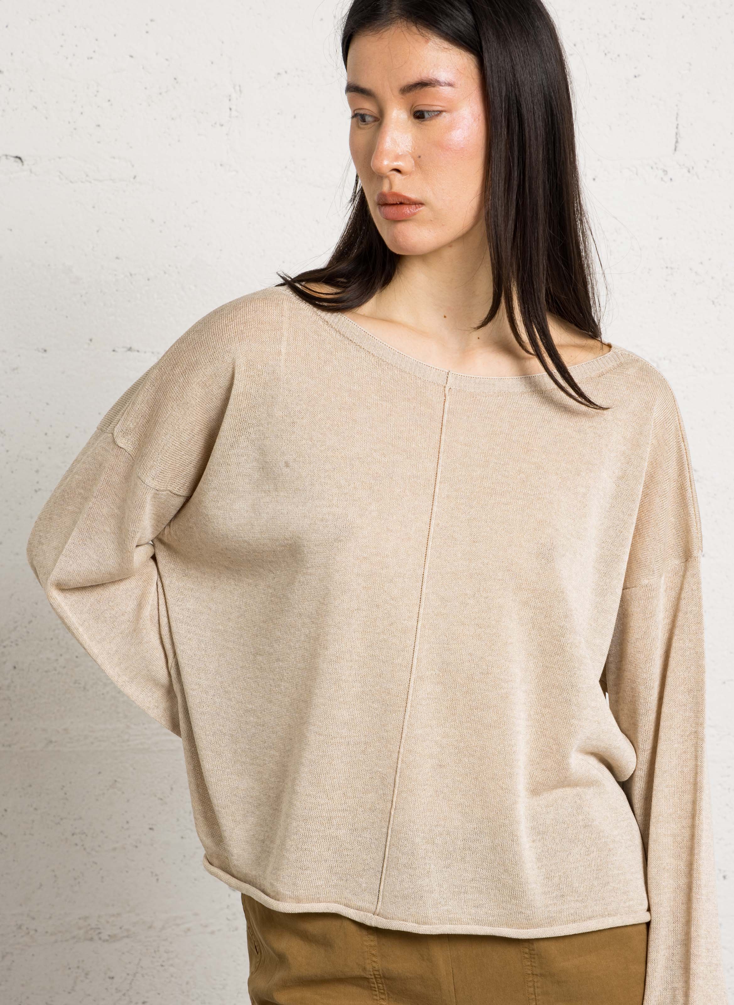 Oversized boat neck sweater with buttoned back. HUMILITY
