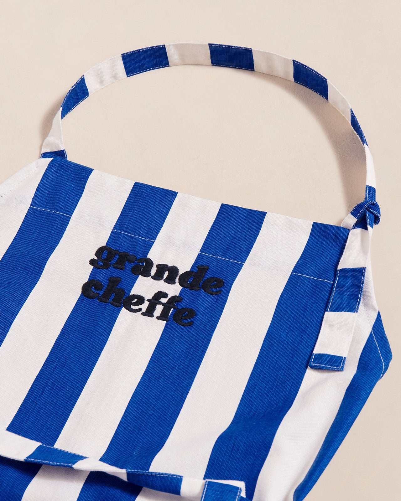 Le tablier grande cheffe à rayures en coton EMOI EMOI Bleu
