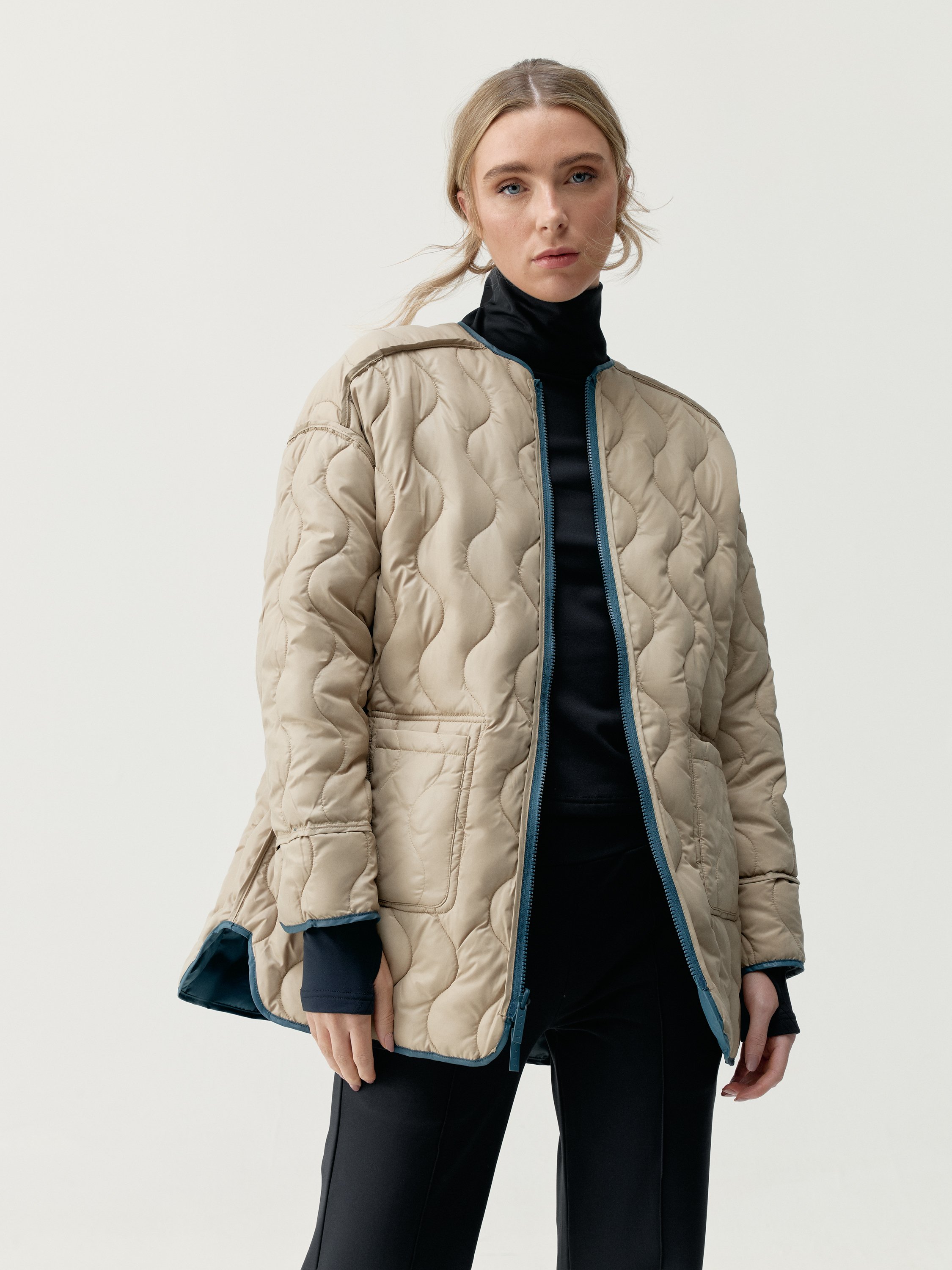 Quilted outer jacket BORN LIVING YOGA Blue
