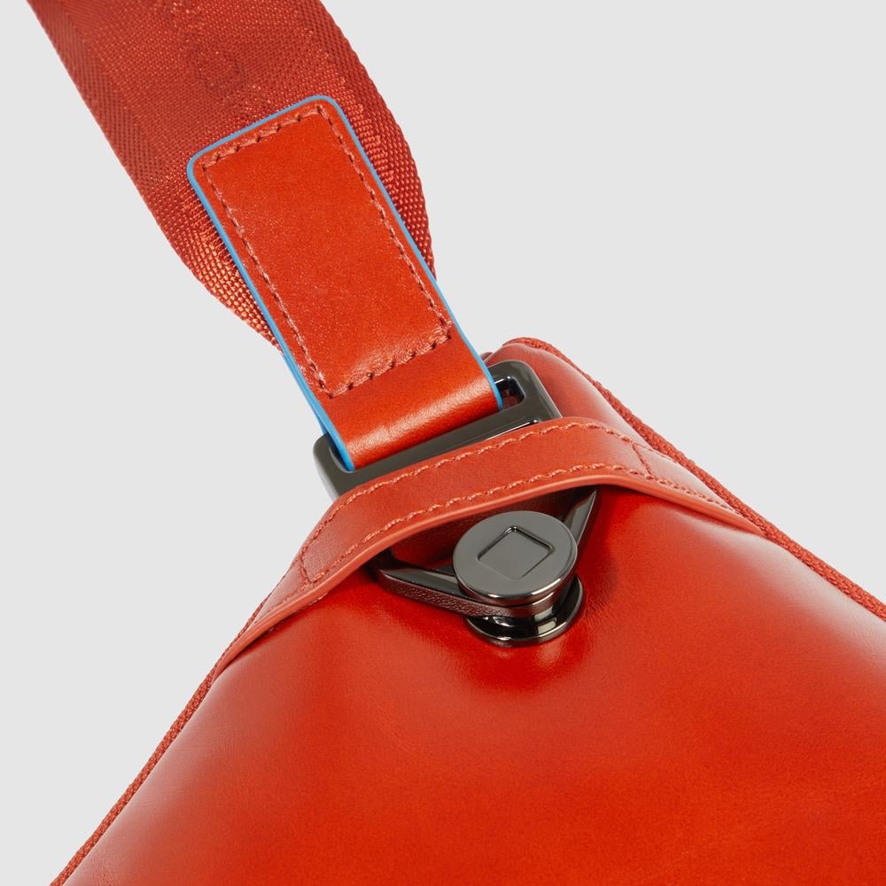 Flat expandable bum bag with repositionable shoulder strap attachments and pocket for airpods® PIQUADRO Brown