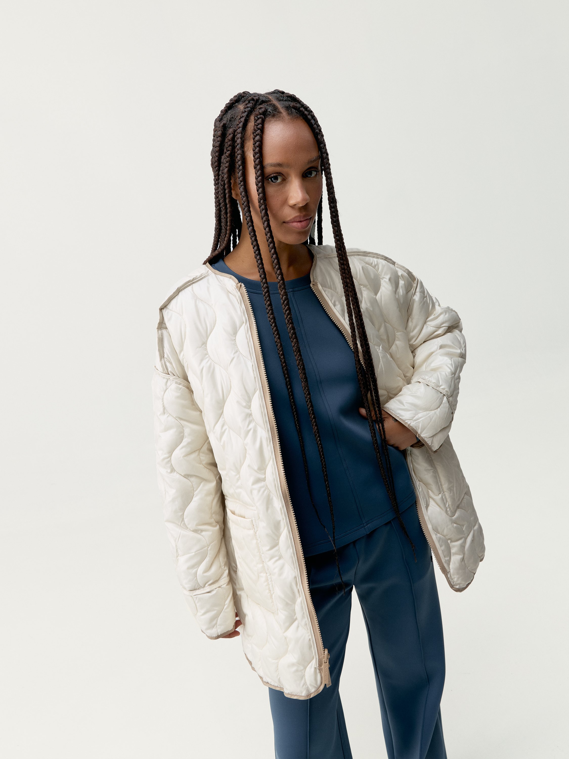 Quilted outer jacket BORN LIVING YOGA Beige