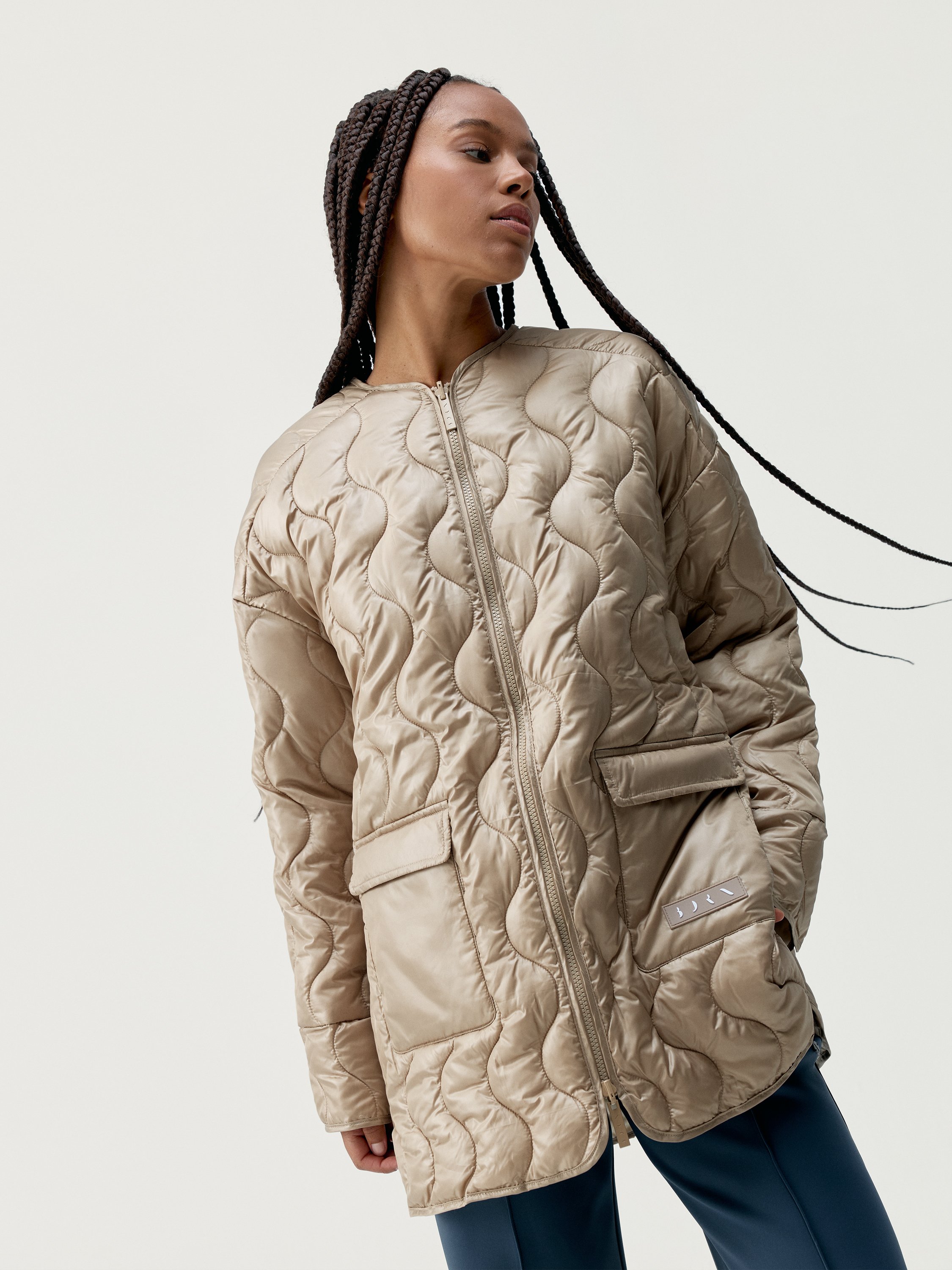 Quilted outer jacket BORN LIVING YOGA Beige