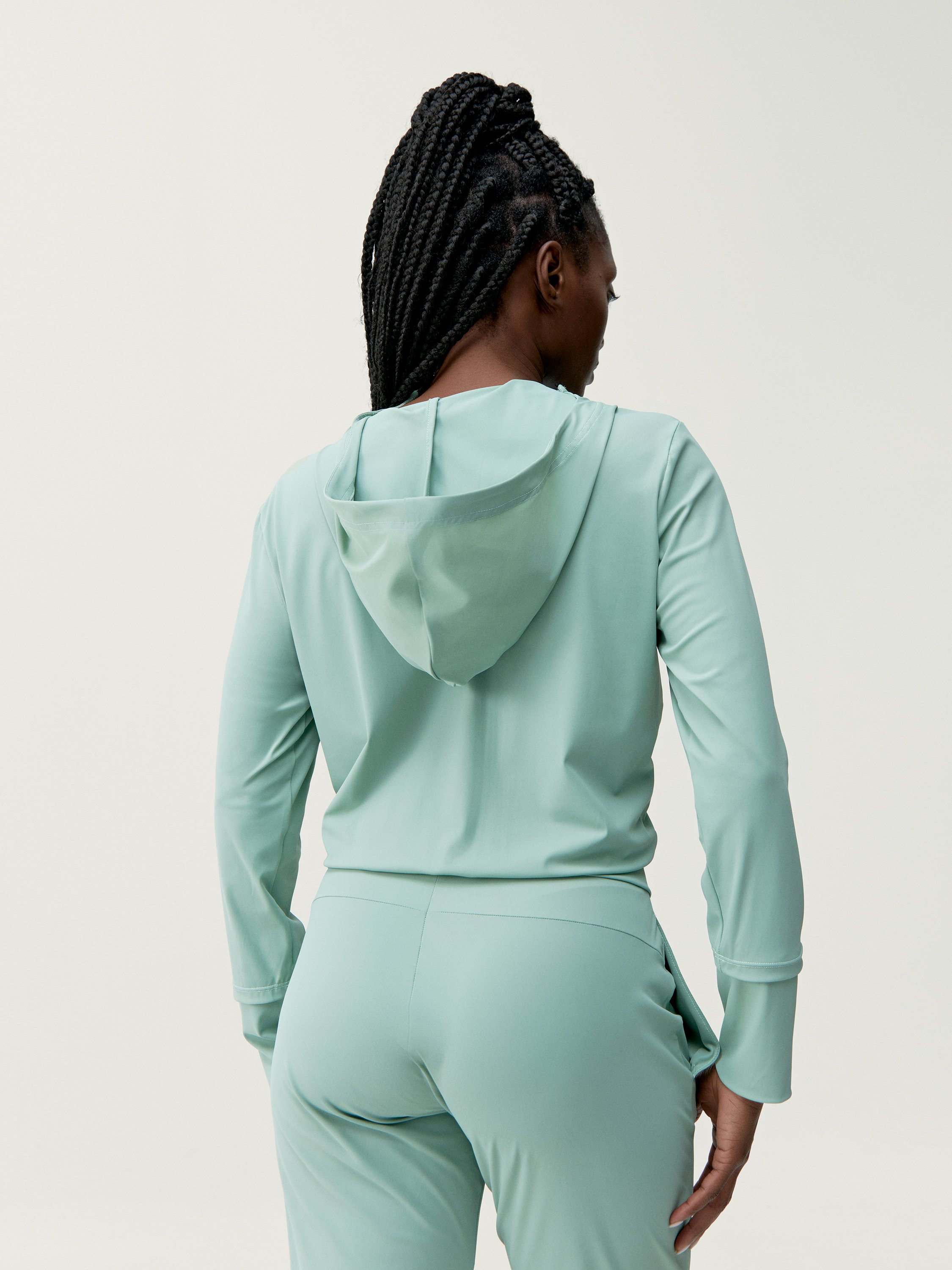 Light hooded sports jacket BORN LIVING YOGA Green