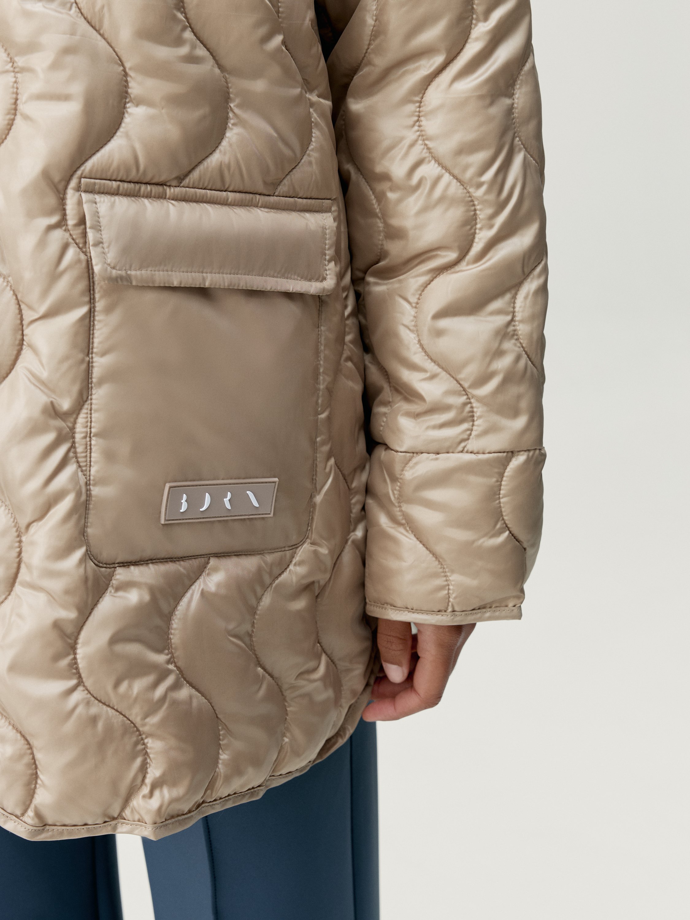 Quilted outer jacket BORN LIVING YOGA Beige