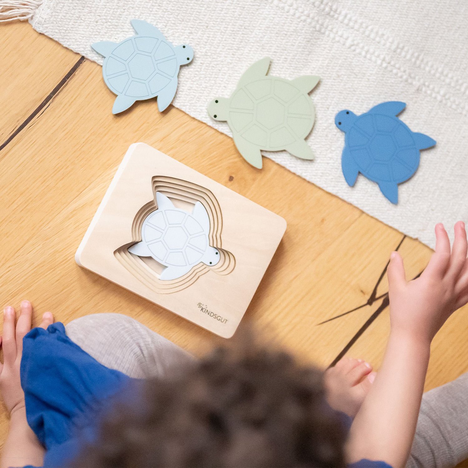 Wooden rabbit puzzle KINDSGUT Green