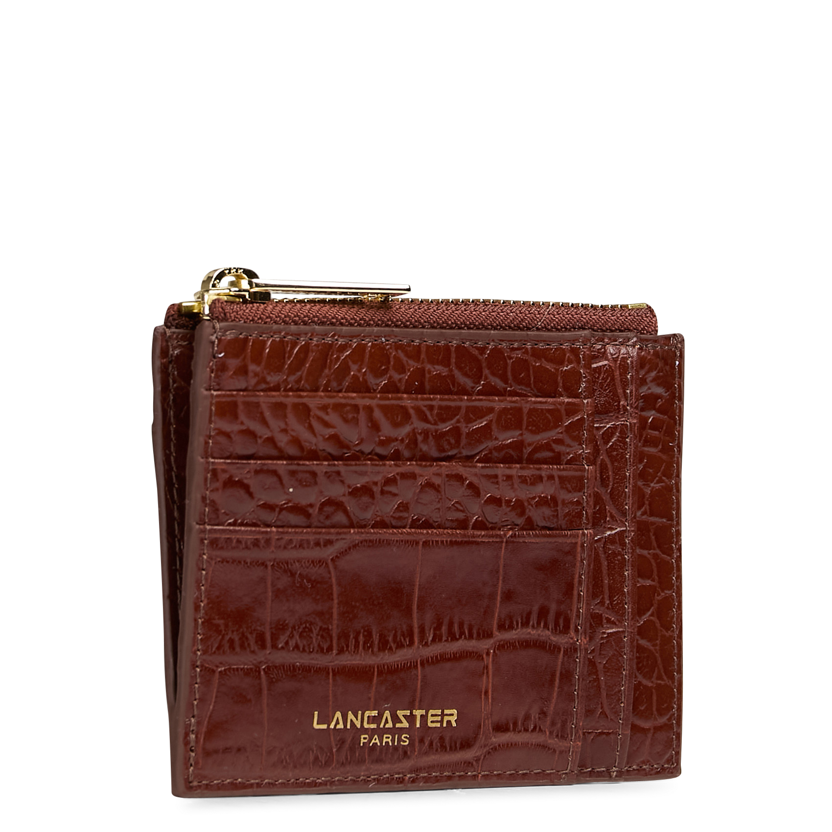 - 100% leer, - 6 kaarthoudersplitten, - 1 centrale zak, - Afmetingen: L10 x H7 cm. LANCASTER PARIS Bruin