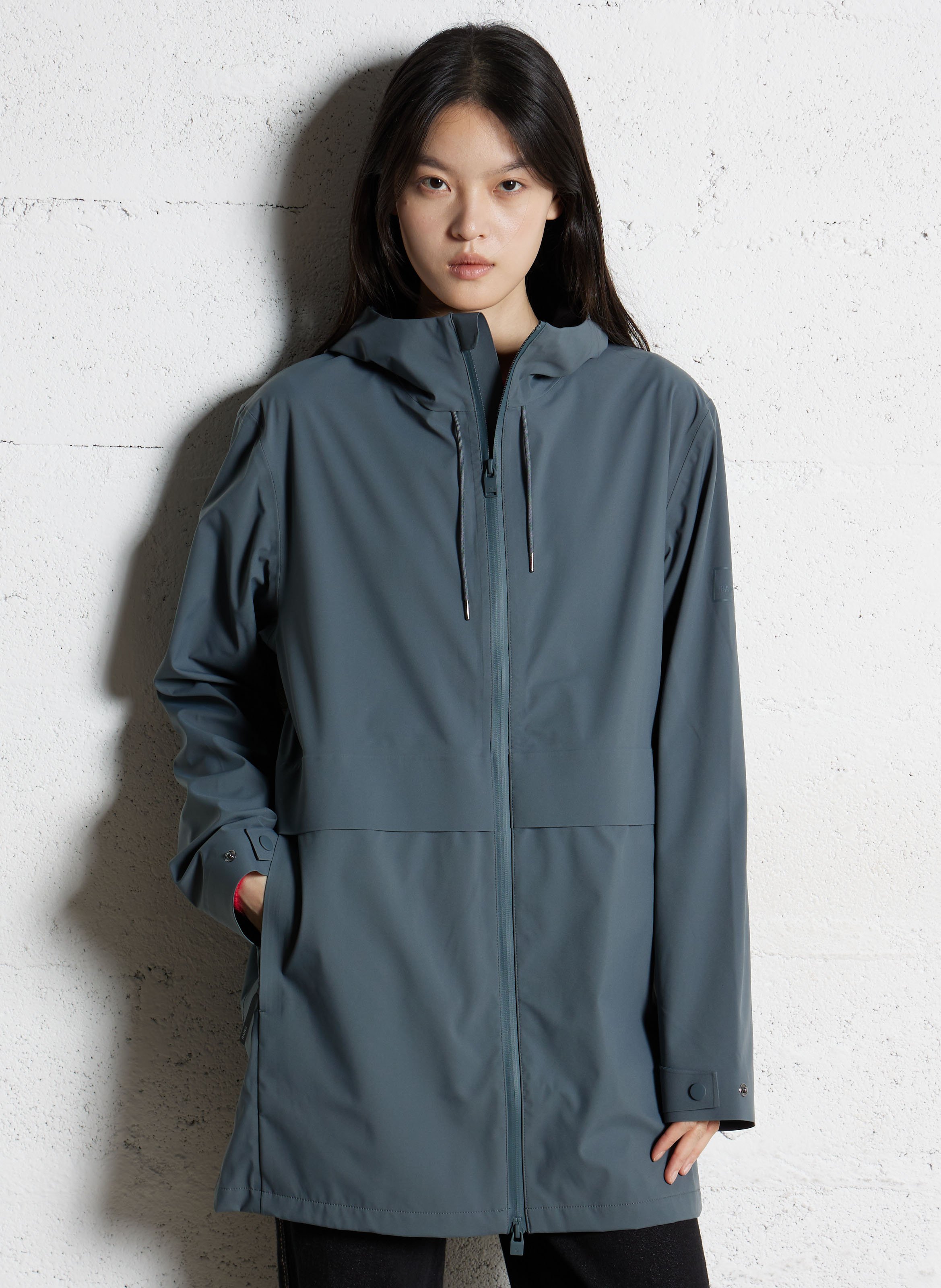 Buttoned and zipped high-neck fitted raincoat RAINS Blue